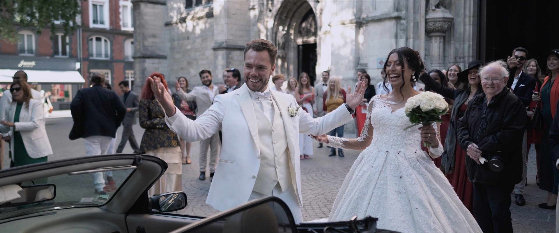 an abstract photo of a curved building with a blue sky in the background