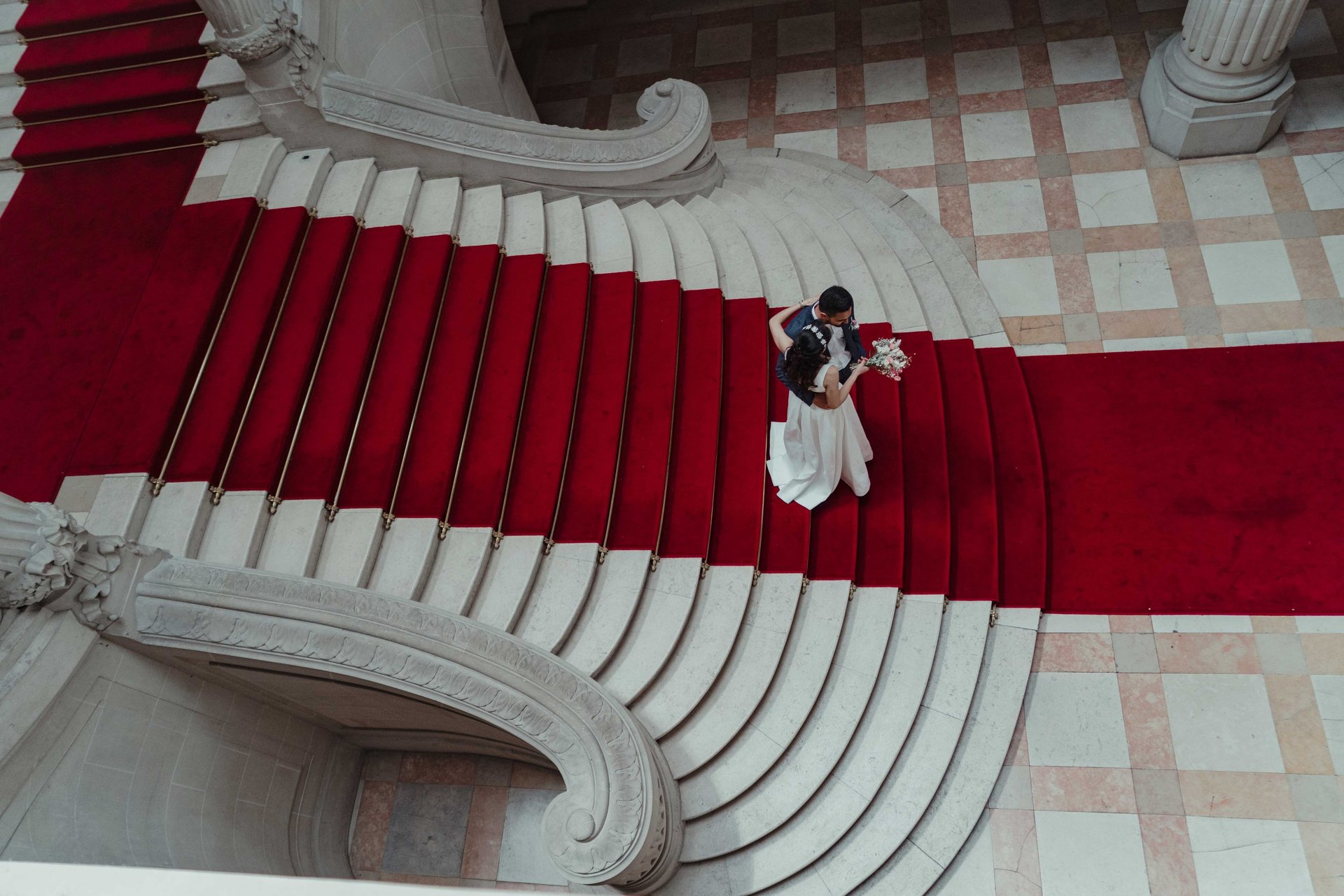 an abstract photo of a curved building with a blue sky in the background