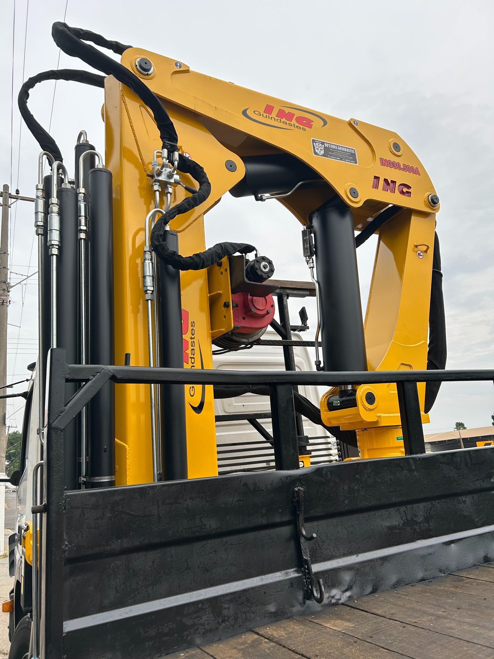 woman wearing yellow long-sleeved dress under white clouds and blue sky during daytime