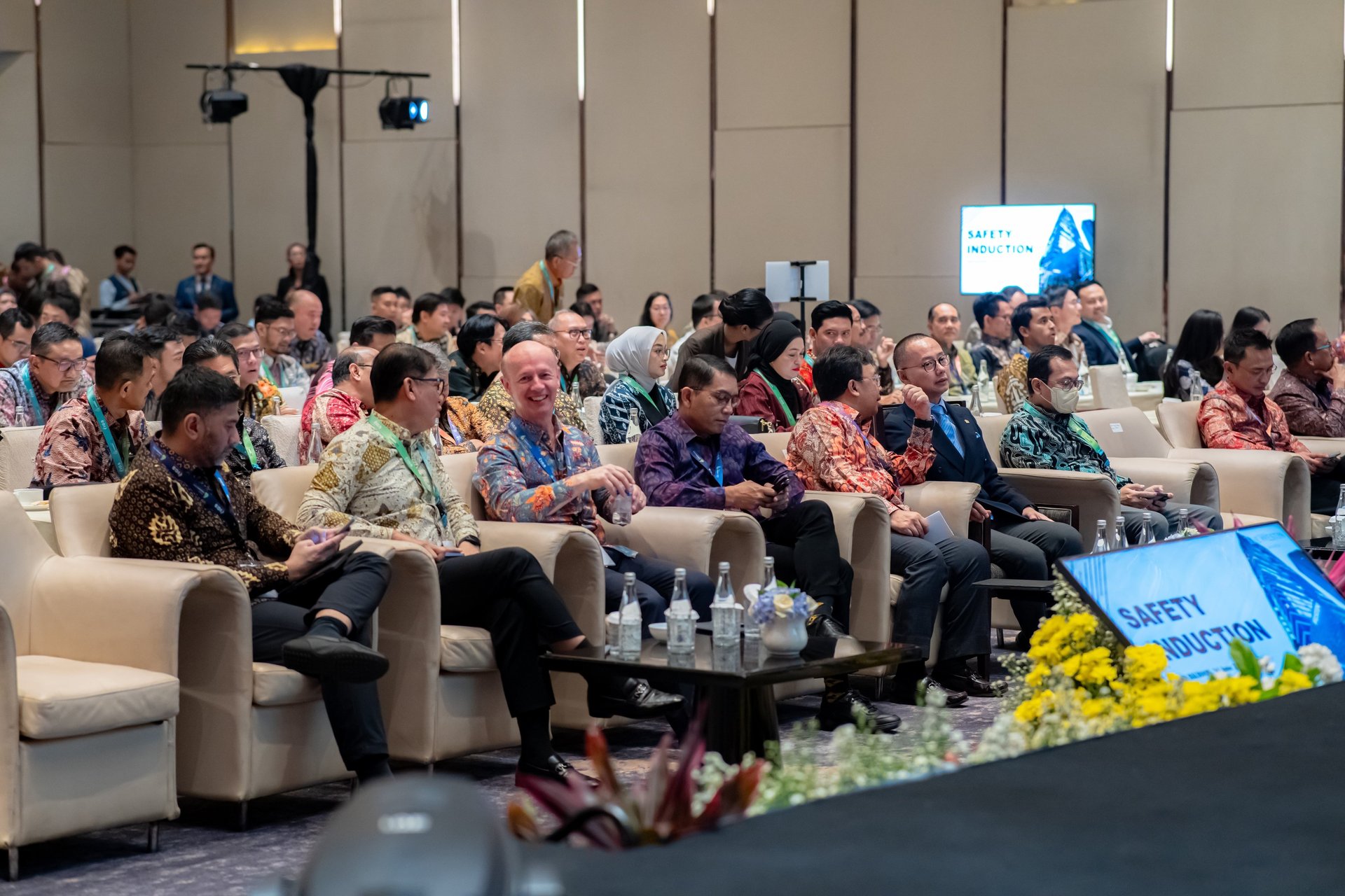 an abstract photo of a curved building with a blue sky in the background