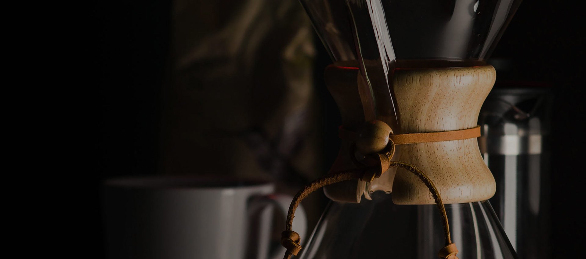 an abstract photo of a curved building with a blue sky in the background