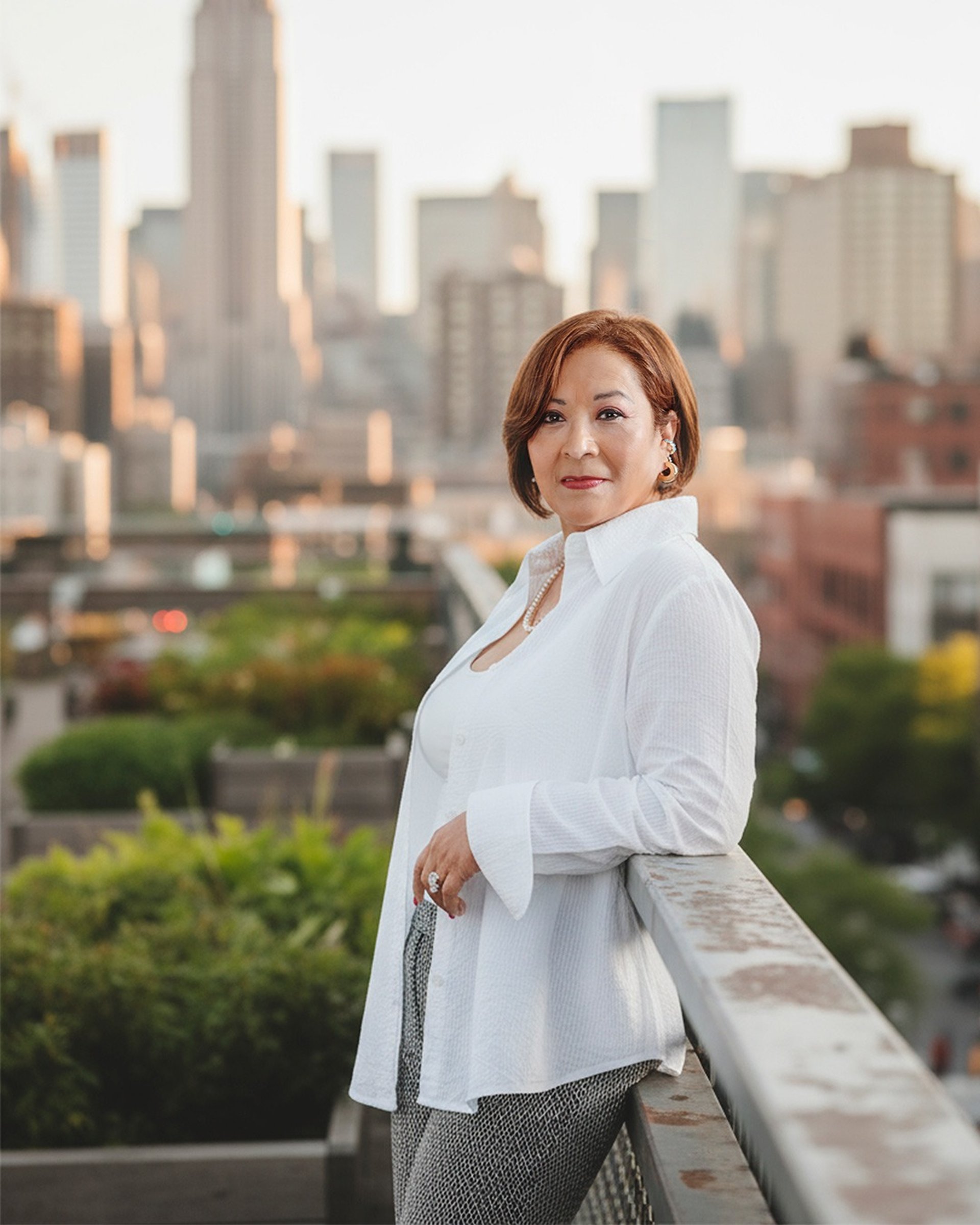 woman wearing yellow long-sleeved dress under white clouds and blue sky during daytime