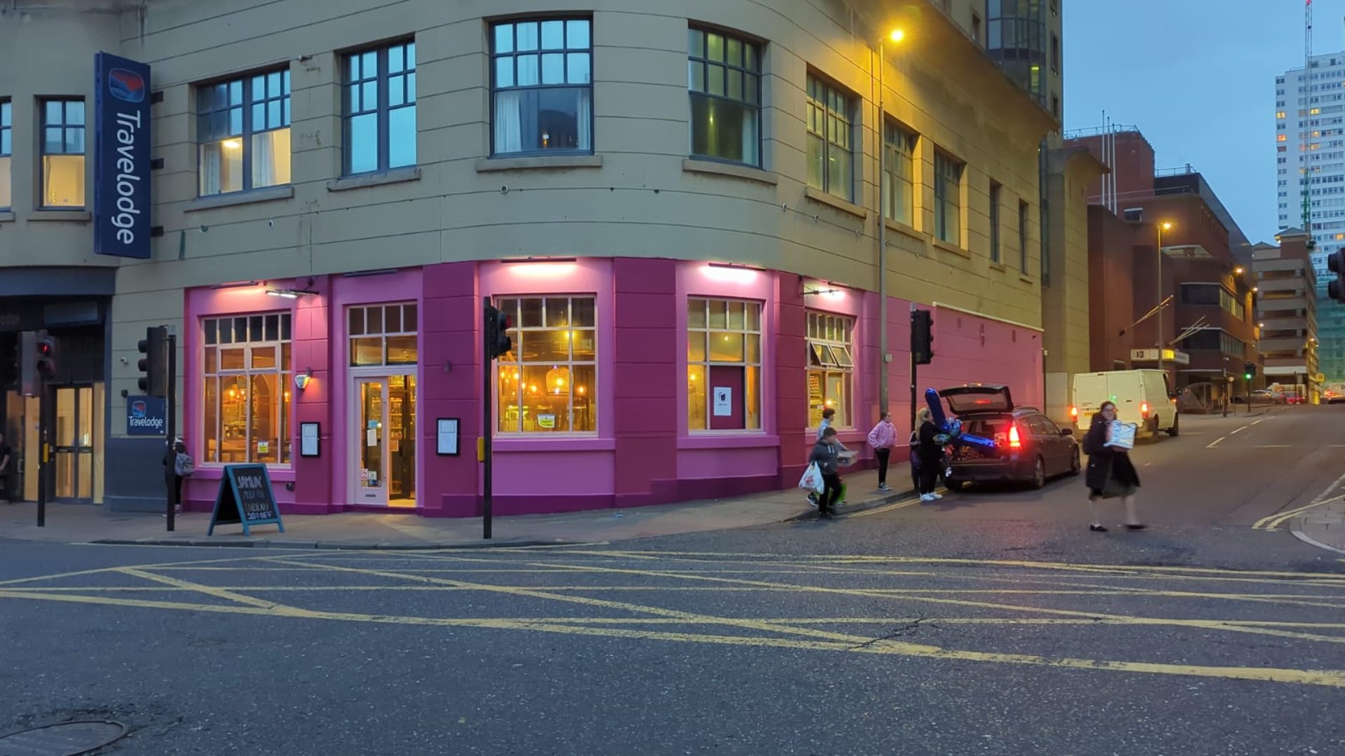 a person is drawing a floor plan on a piece of paper