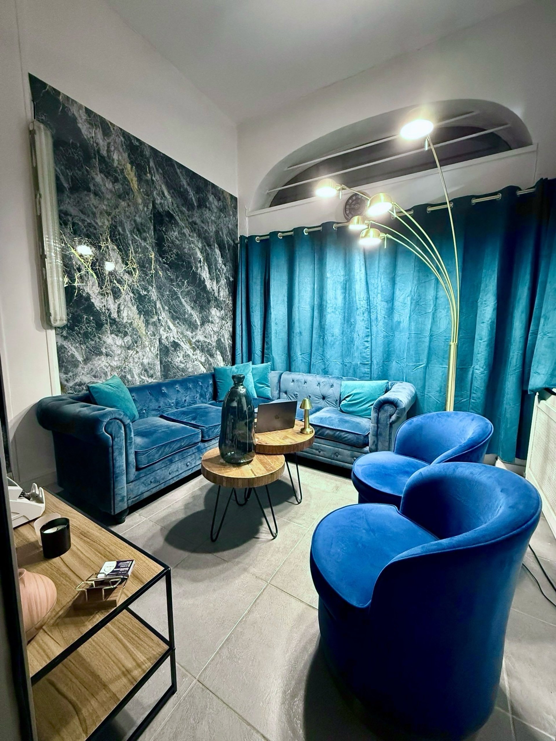 black and brown leather padded tub sofa