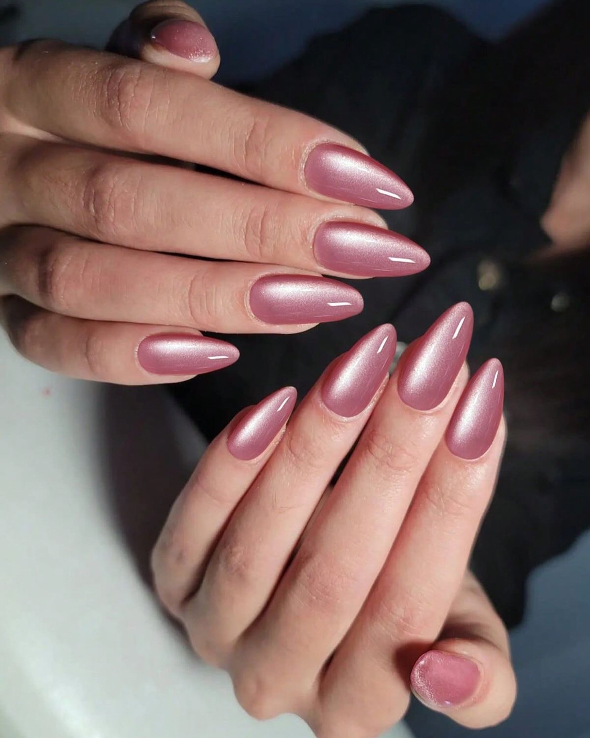 person wearing grey knit sweater