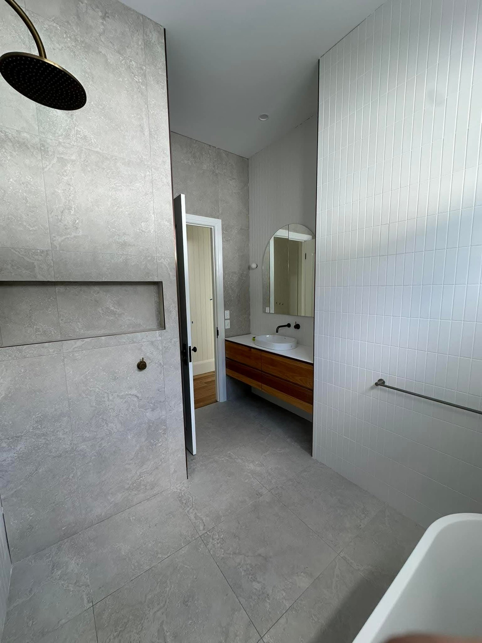 white ceramic sink near white ceramic sink