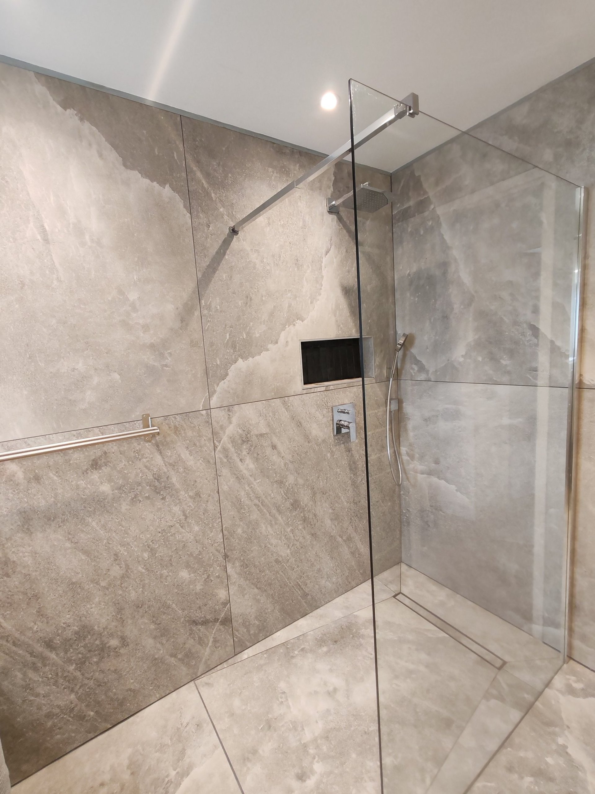 an abstract photo of a curved building with a blue sky in the background