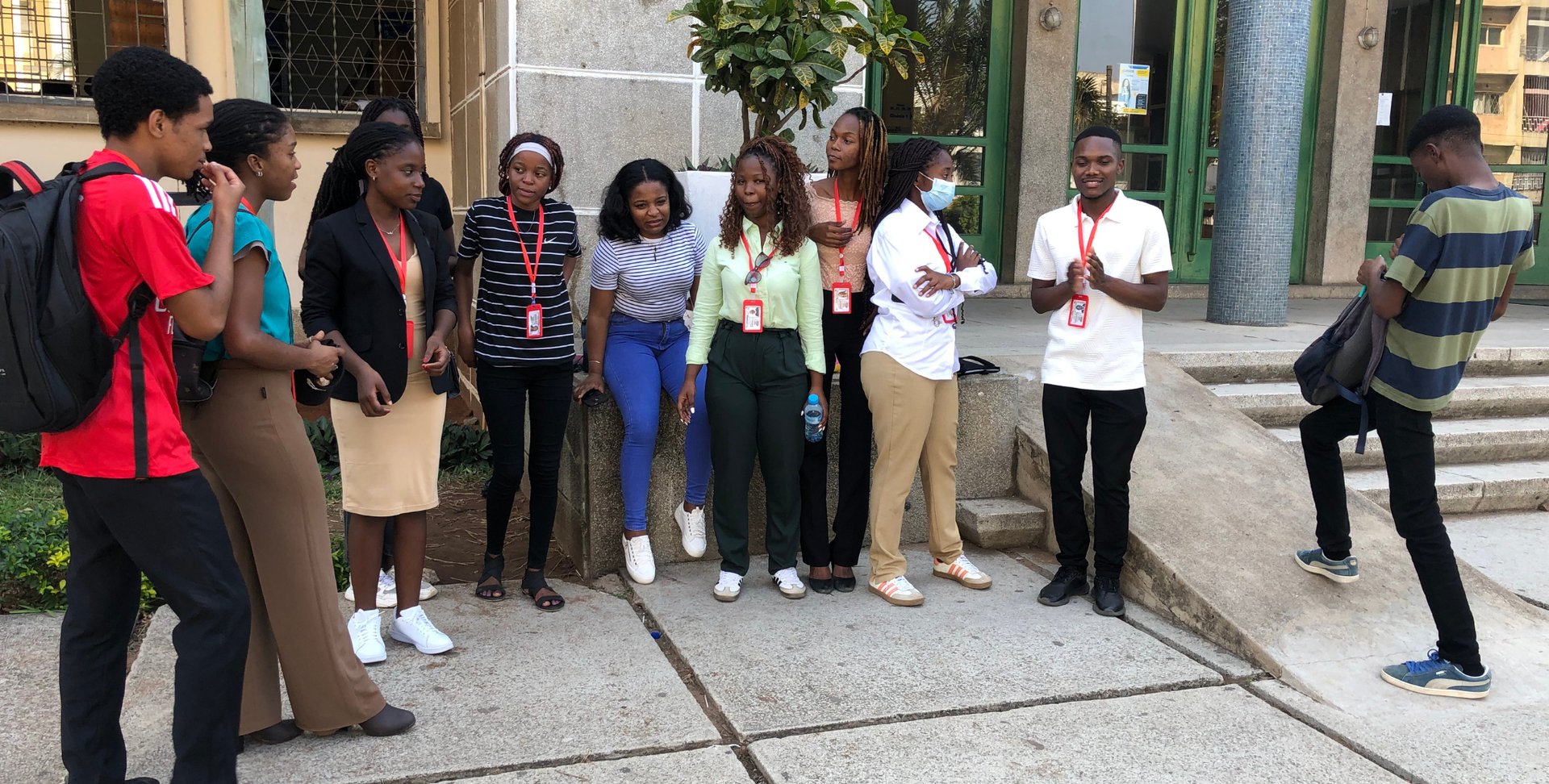 an abstract photo of a curved building with a blue sky in the background