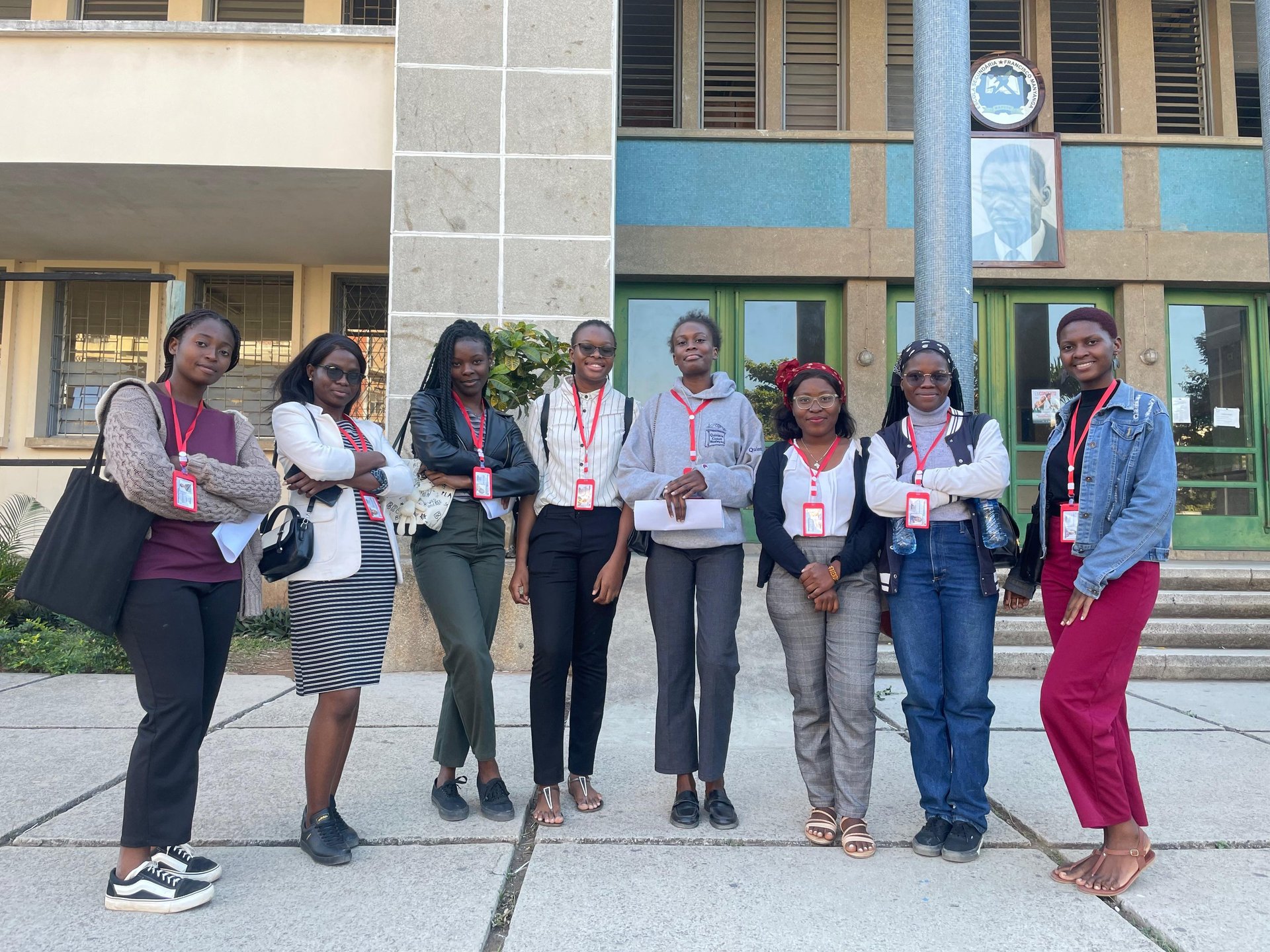 an abstract photo of a curved building with a blue sky in the background