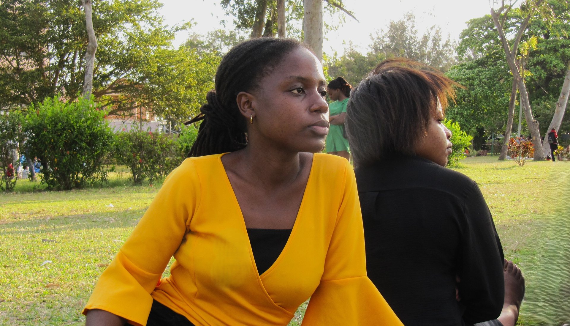 an abstract photo of a curved building with a blue sky in the background