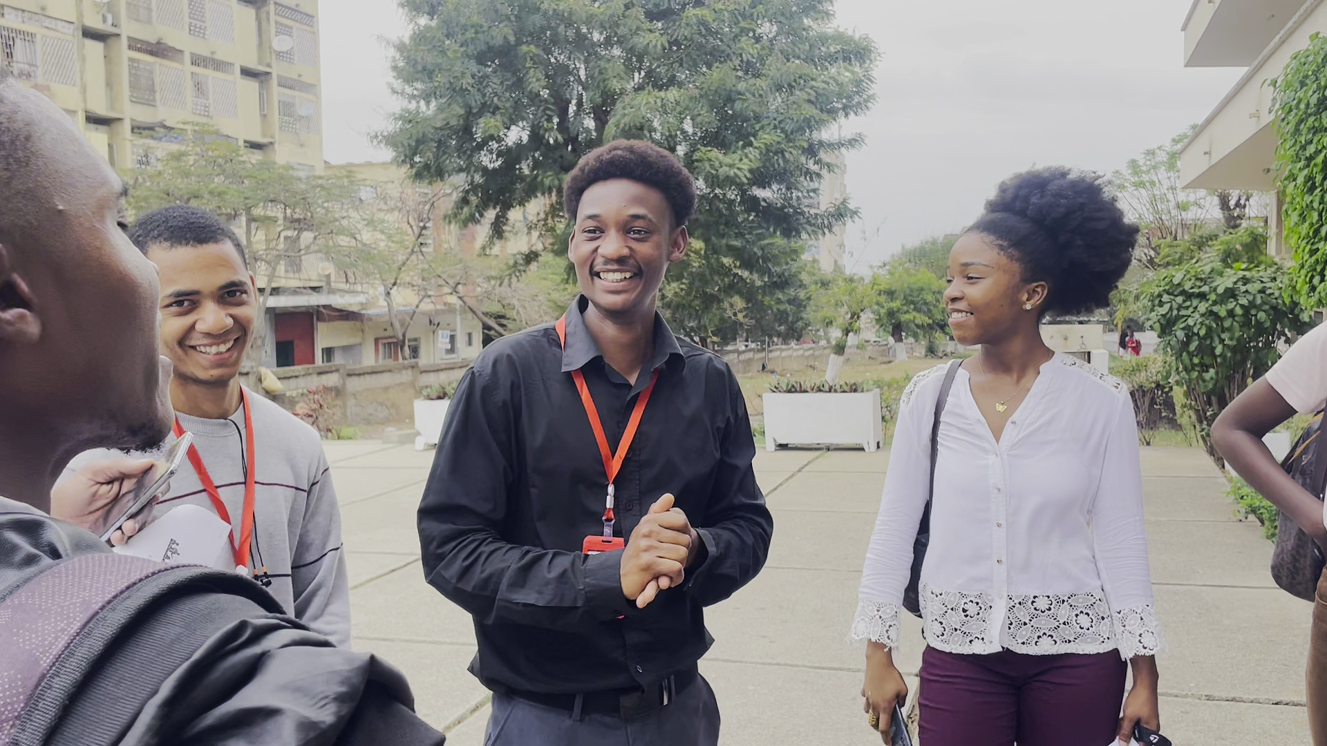 an abstract photo of a curved building with a blue sky in the background