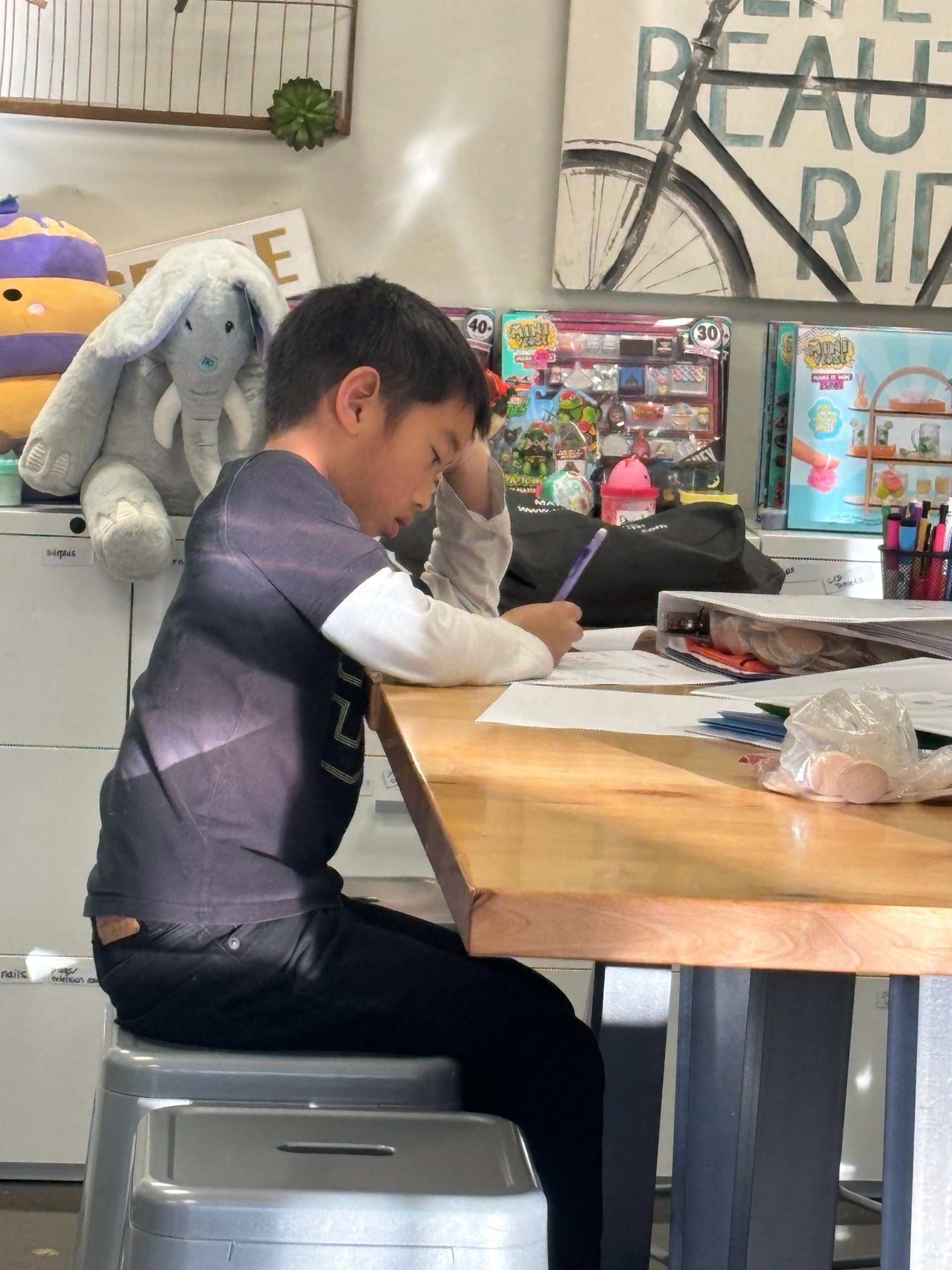 an abstract photo of a curved building with a blue sky in the background