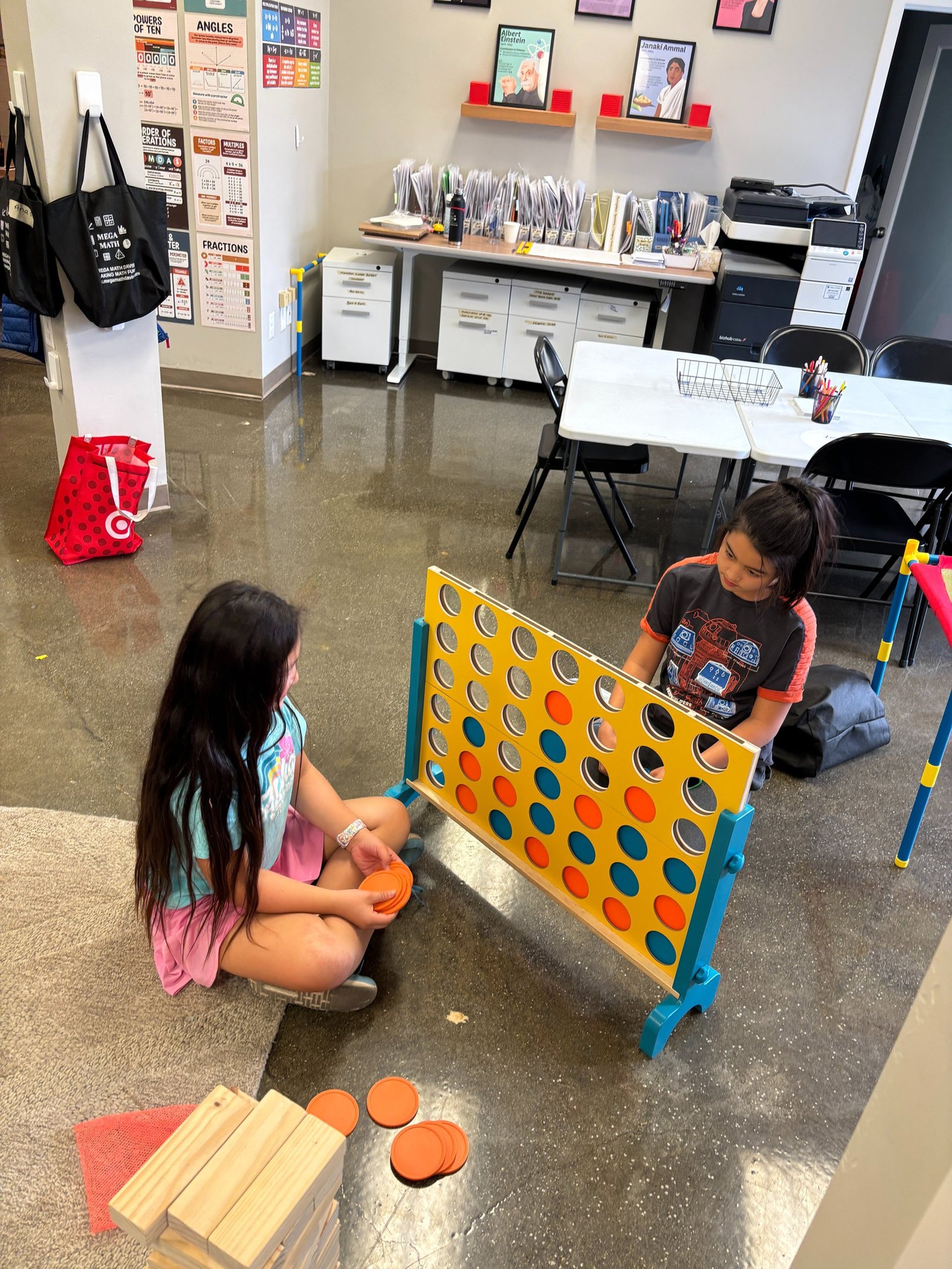 an abstract photo of a curved building with a blue sky in the background