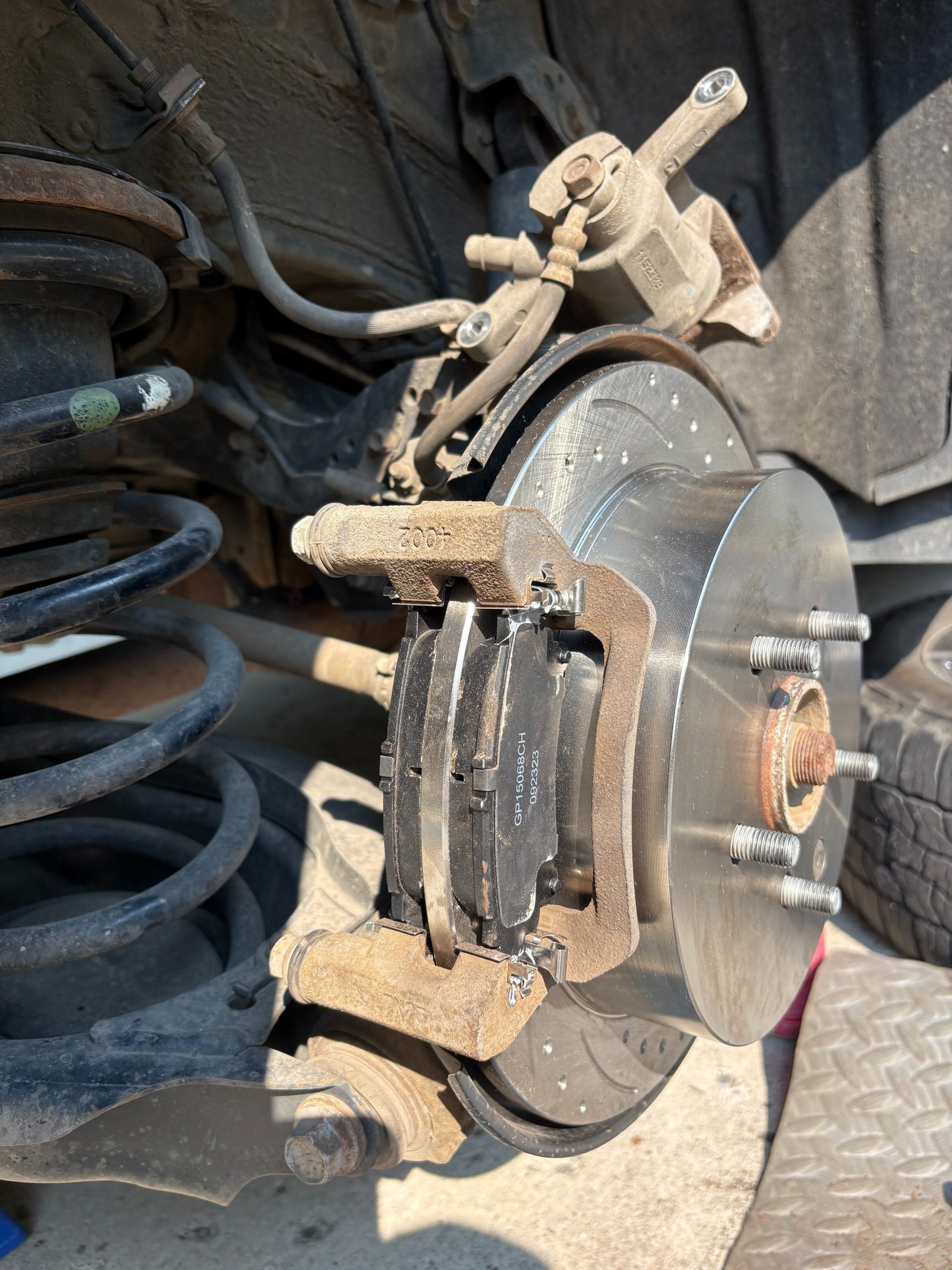 woman wearing yellow long-sleeved dress under white clouds and blue sky during daytime