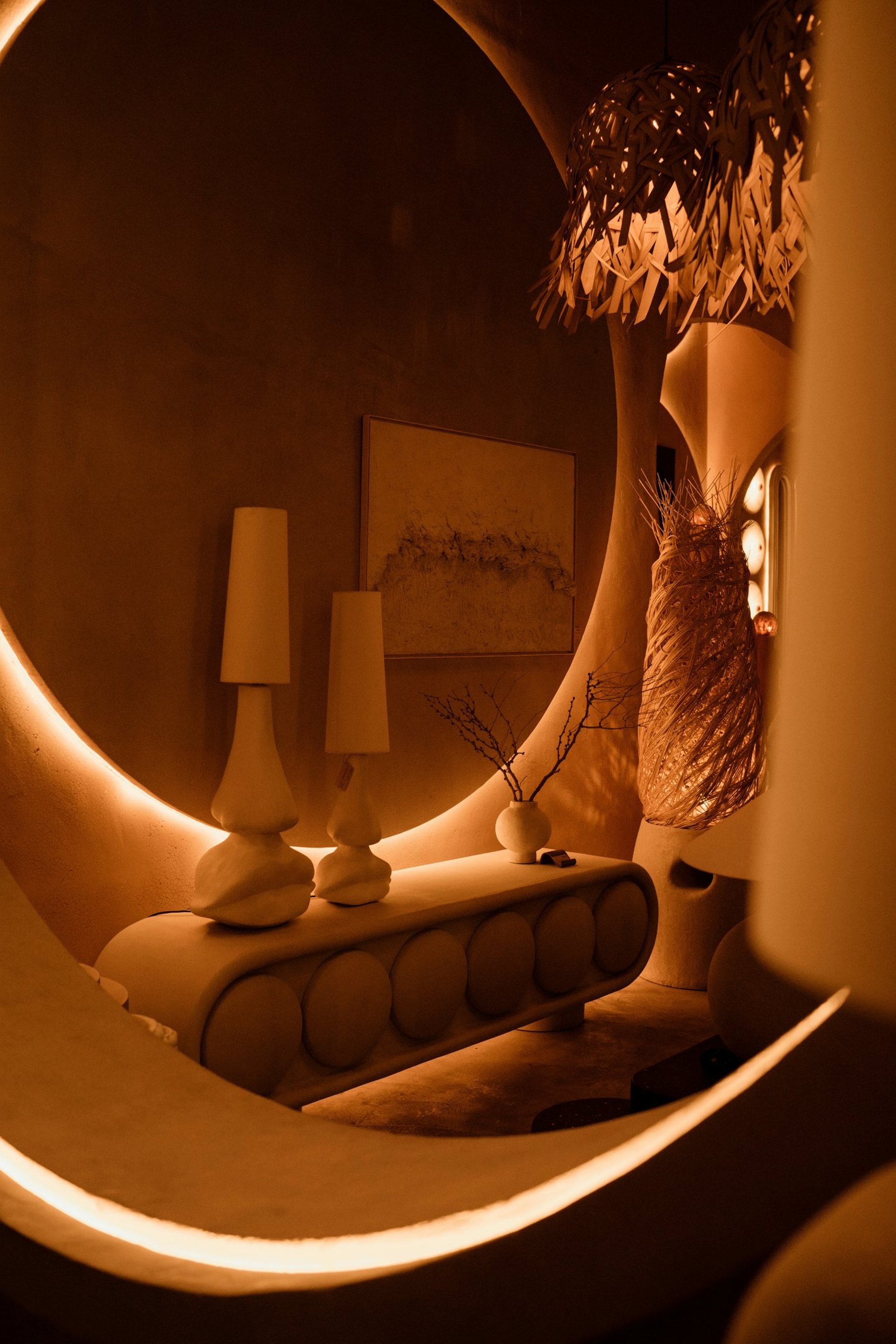 an abstract photo of a curved building with a blue sky in the background