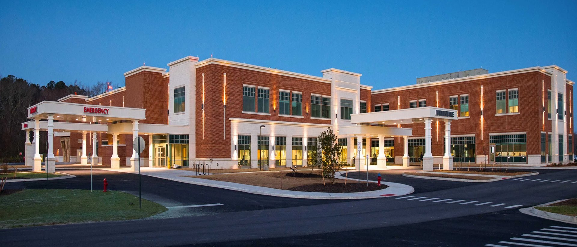 black and brown leather padded tub sofa