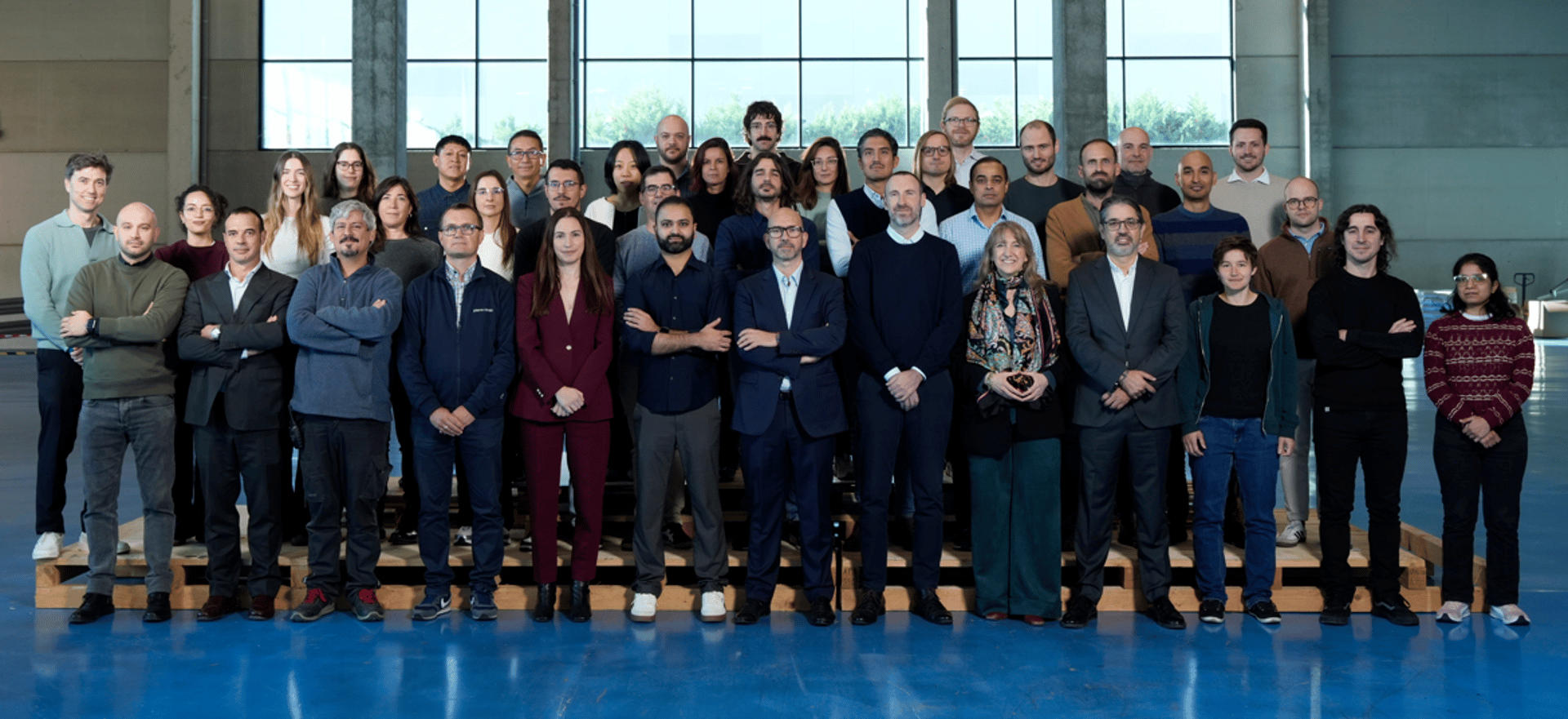 an abstract photo of a curved building with a blue sky in the background