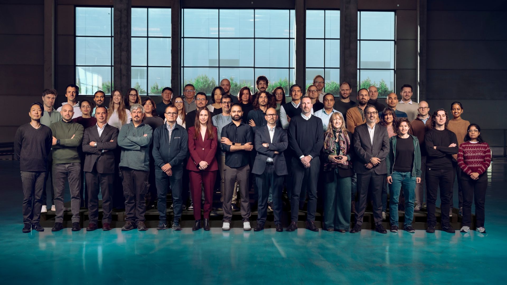 an abstract photo of a curved building with a blue sky in the background