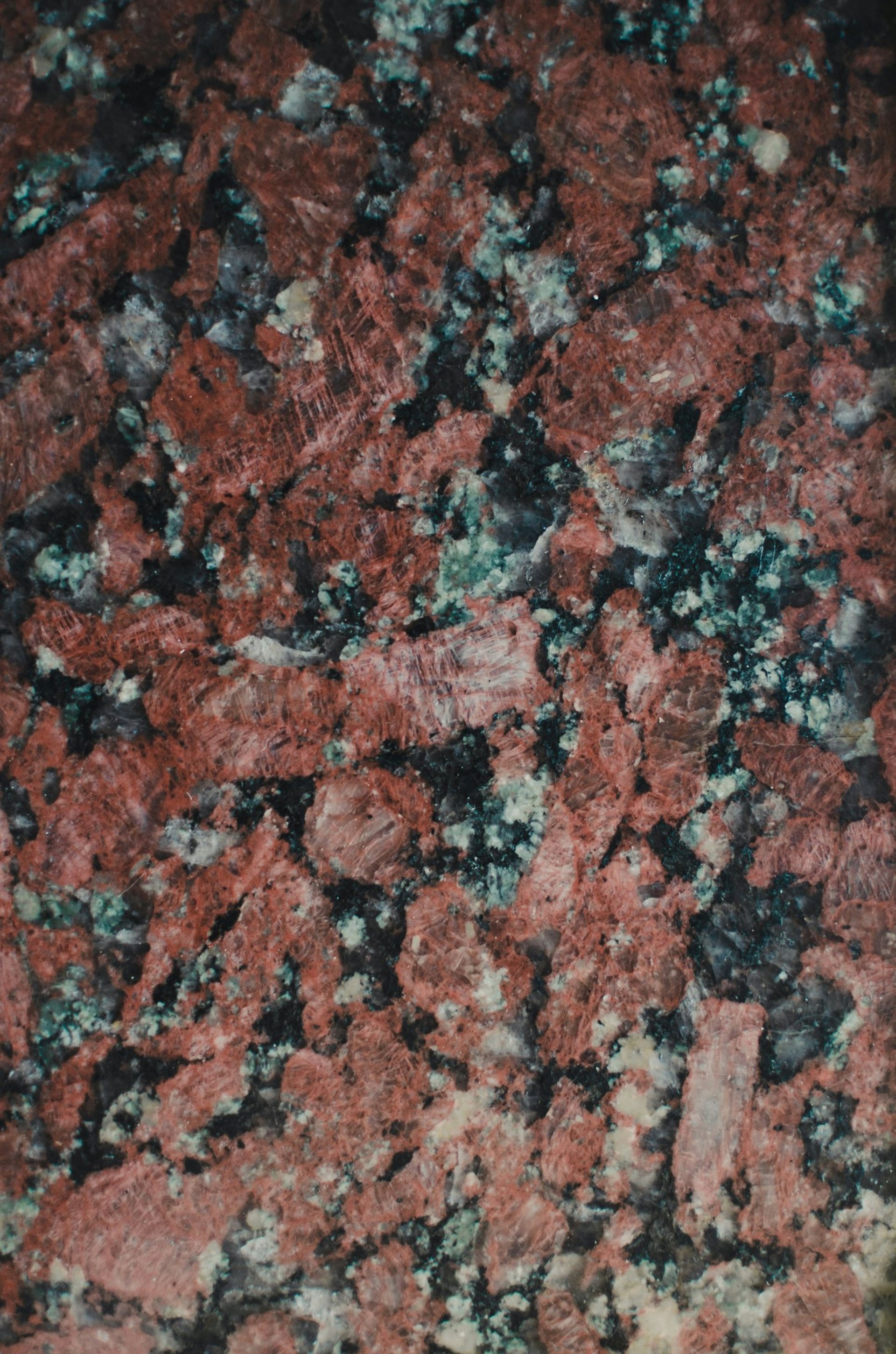 a black and white photo of a marble surface