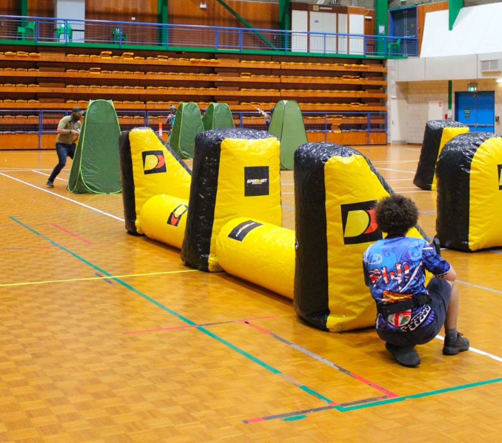 an abstract photo of a curved building with a blue sky in the background