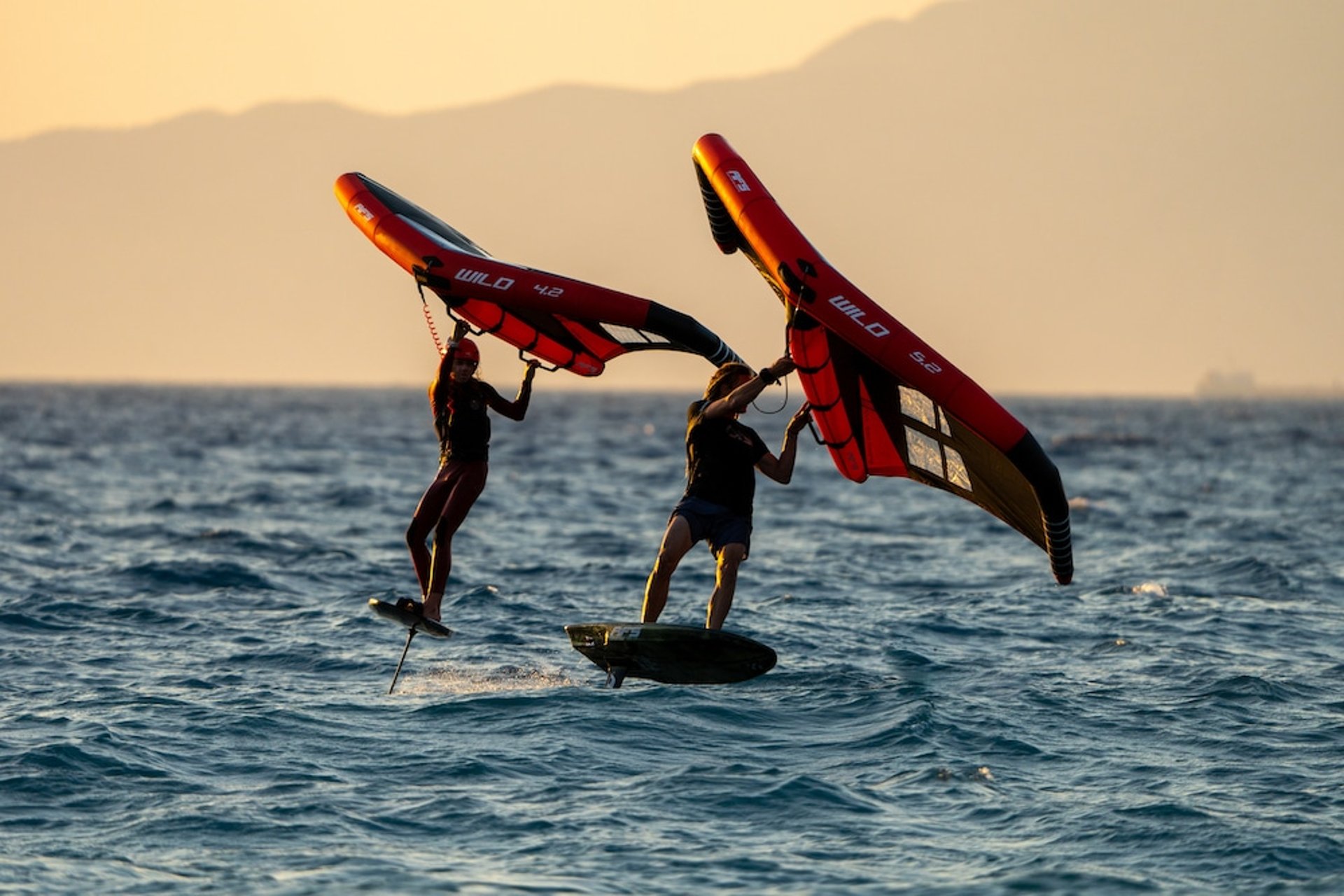 an abstract photo of a curved building with a blue sky in the background