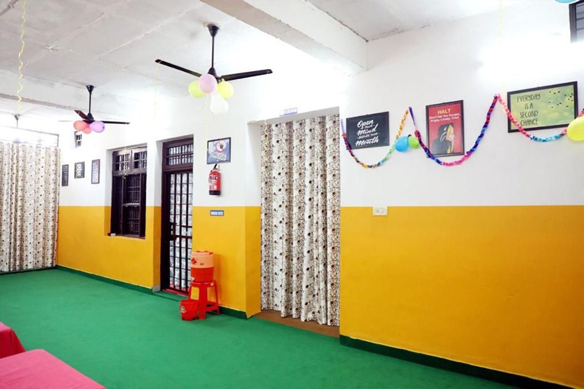 woman wearing yellow long-sleeved dress under white clouds and blue sky during daytime