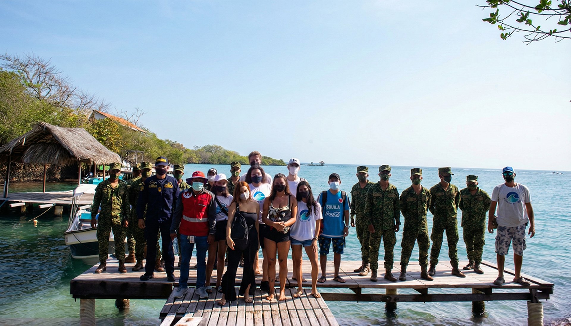 wind turbines on snowy mountain under clear blue sky during daytime