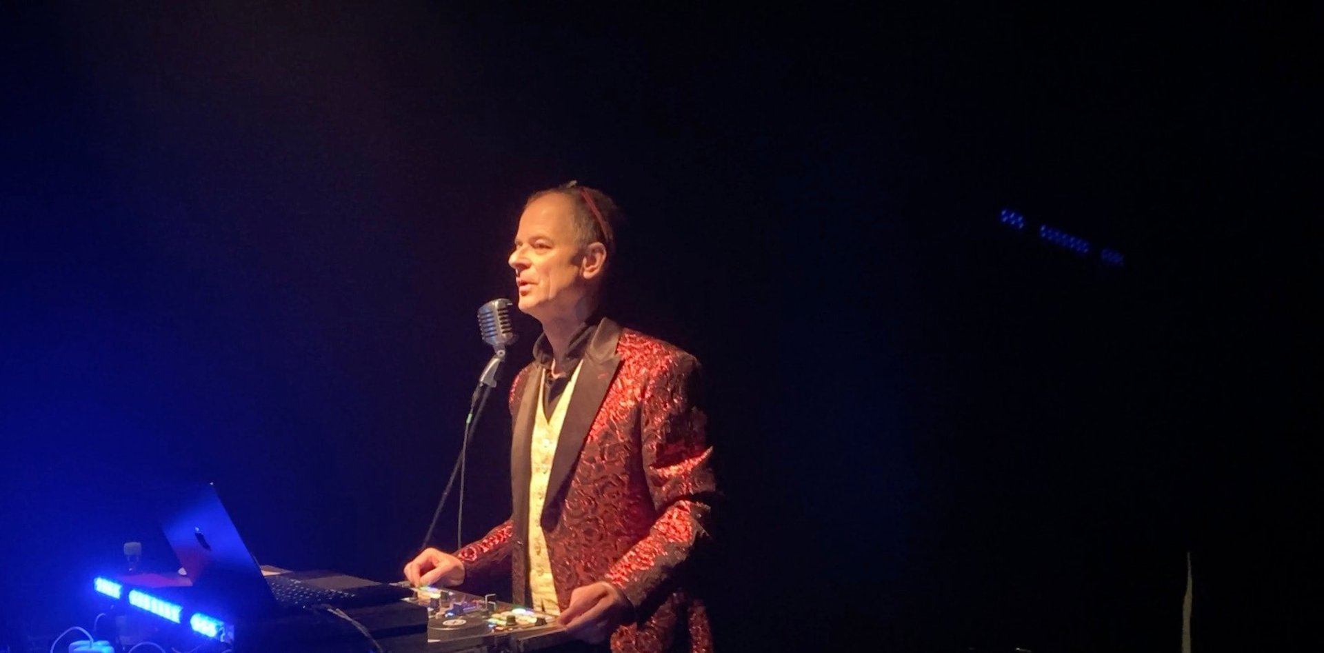 a pair of headphones sitting on top of a dj's decks
