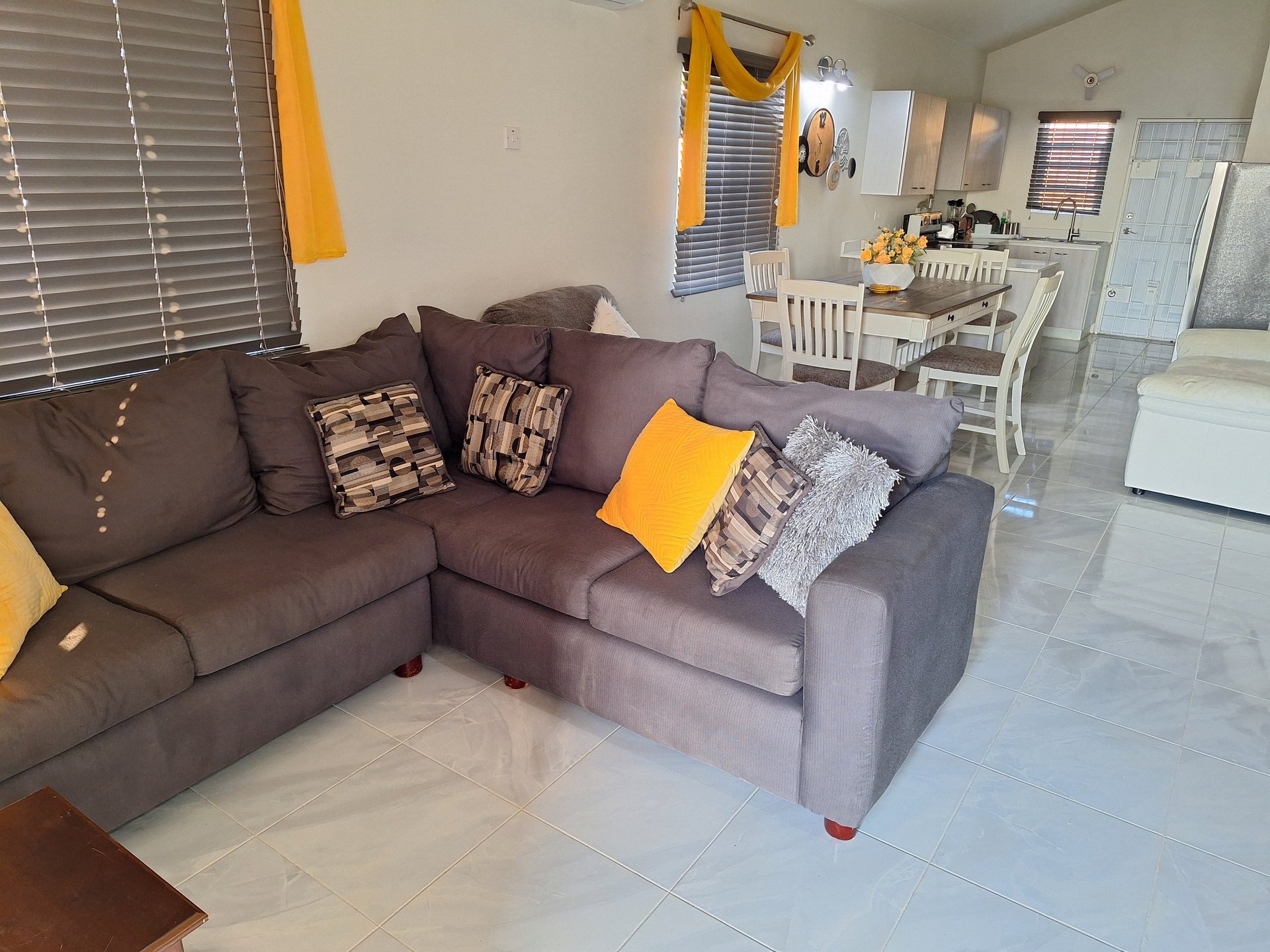 an abstract photo of a curved building with a blue sky in the background