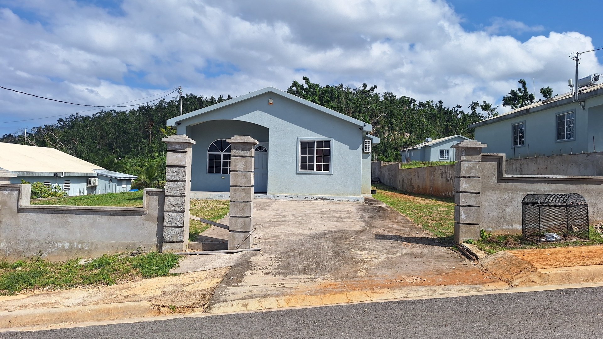 an abstract photo of a curved building with a blue sky in the background