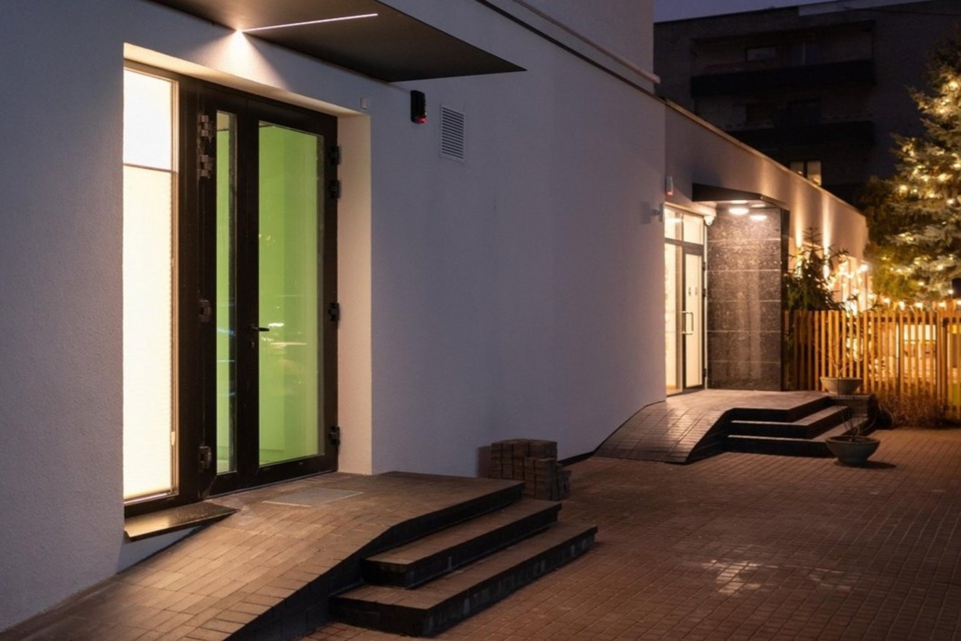 A large white room with lots of shelves