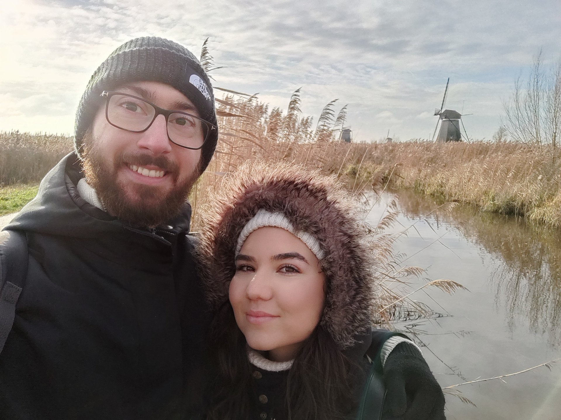 couple wearing silver-colored rings