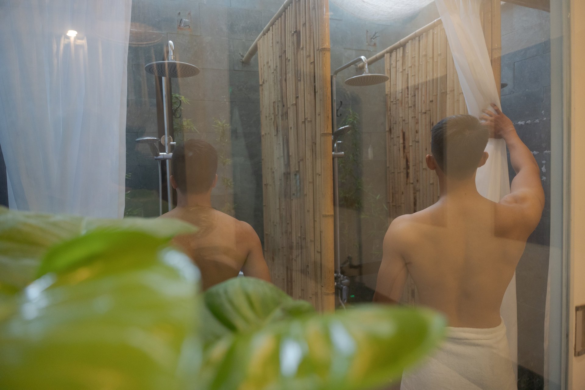 black and brown leather padded tub sofa