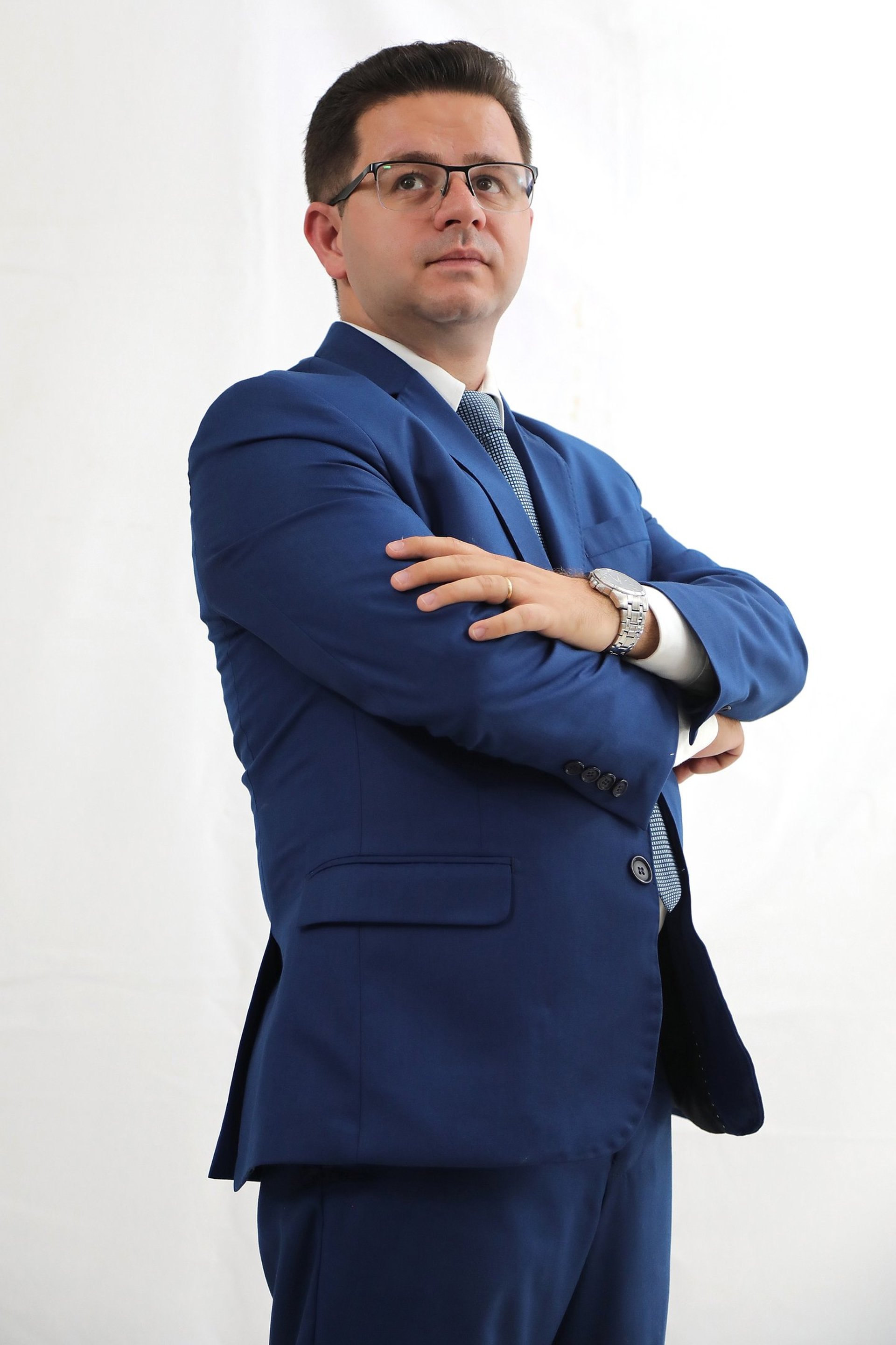 woman wearing yellow long-sleeved dress under white clouds and blue sky during daytime
