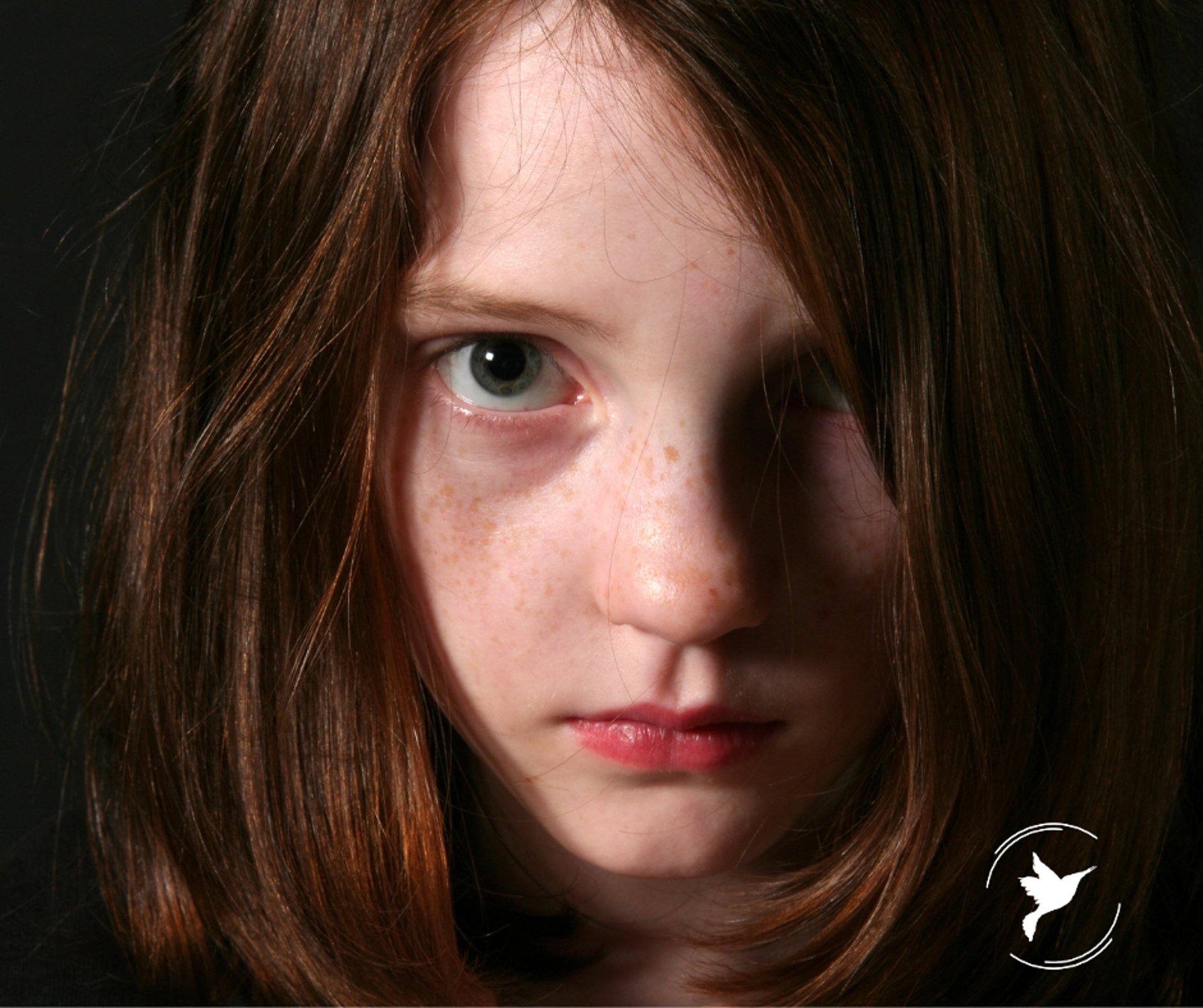 an abstract photo of a curved building with a blue sky in the background