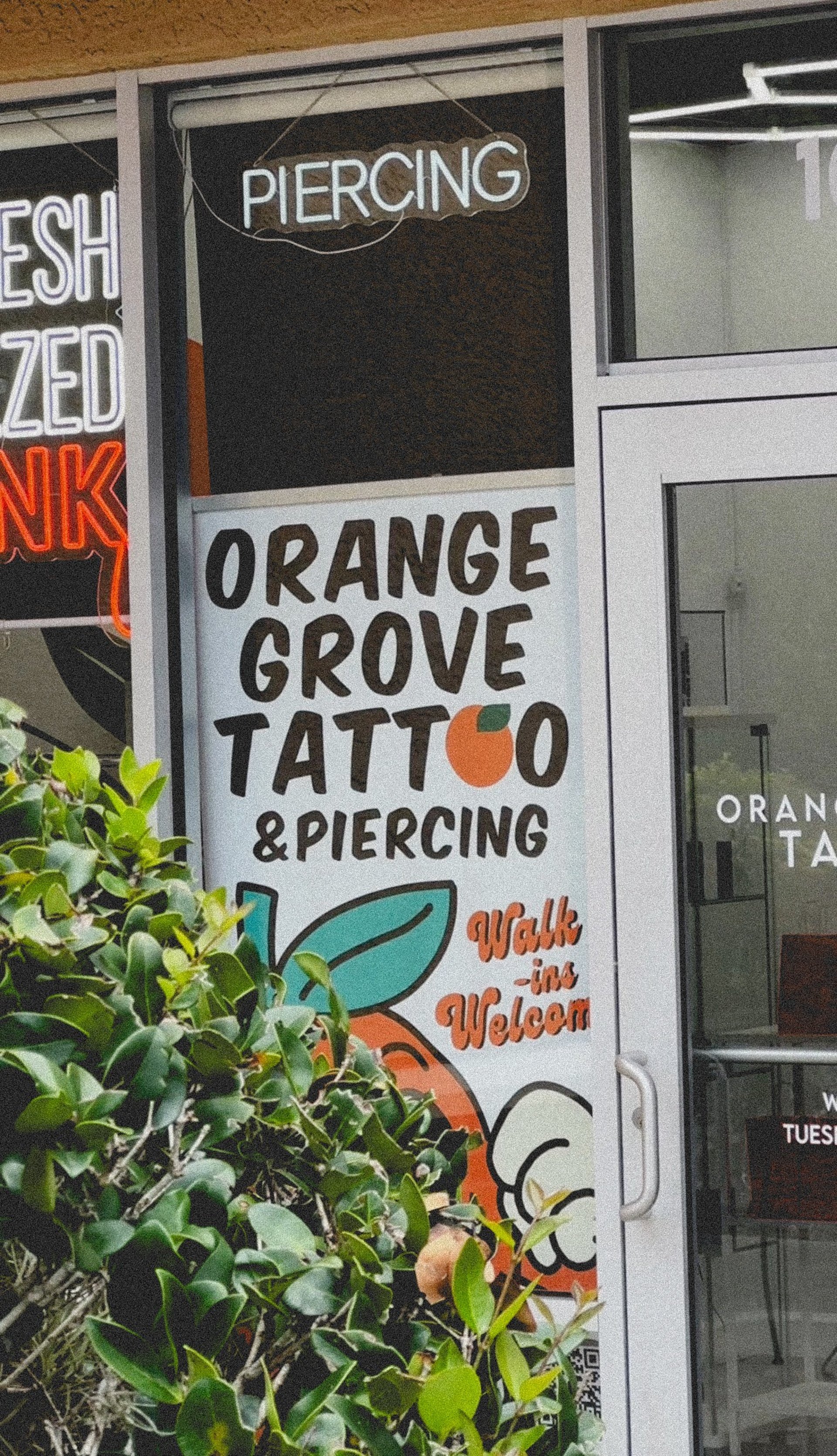 Exterior front window at Orange Grove Tattoo
