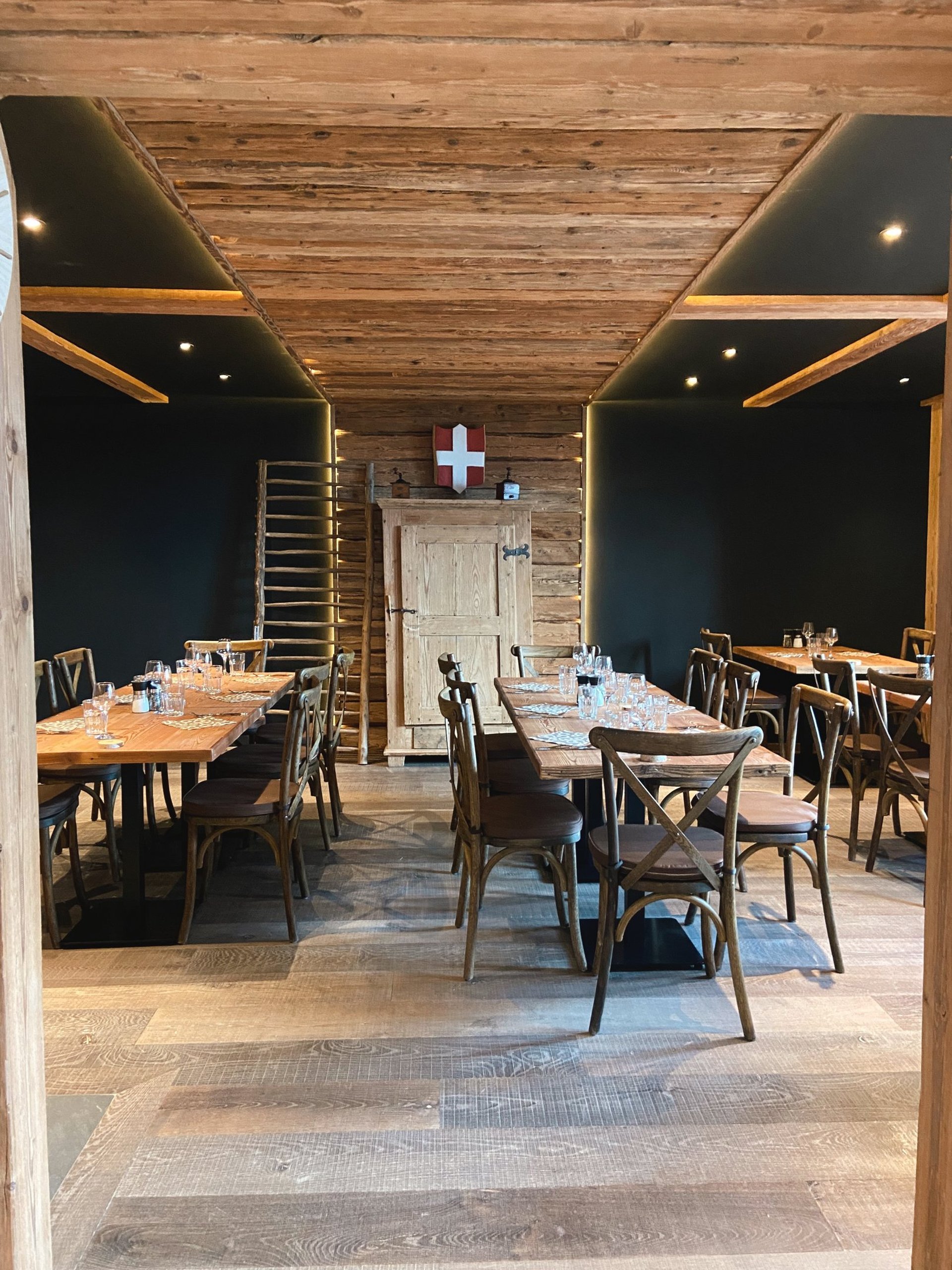 an abstract photo of a curved building with a blue sky in the background