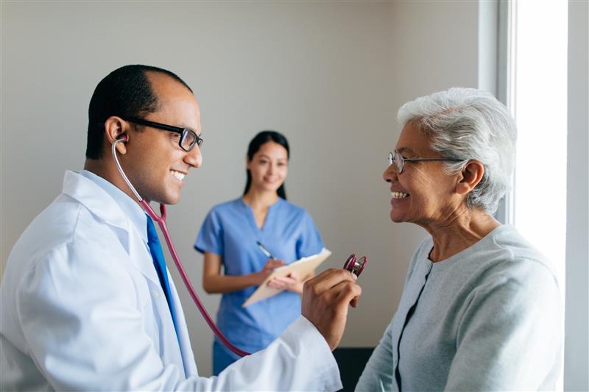 an abstract photo of a curved building with a blue sky in the background