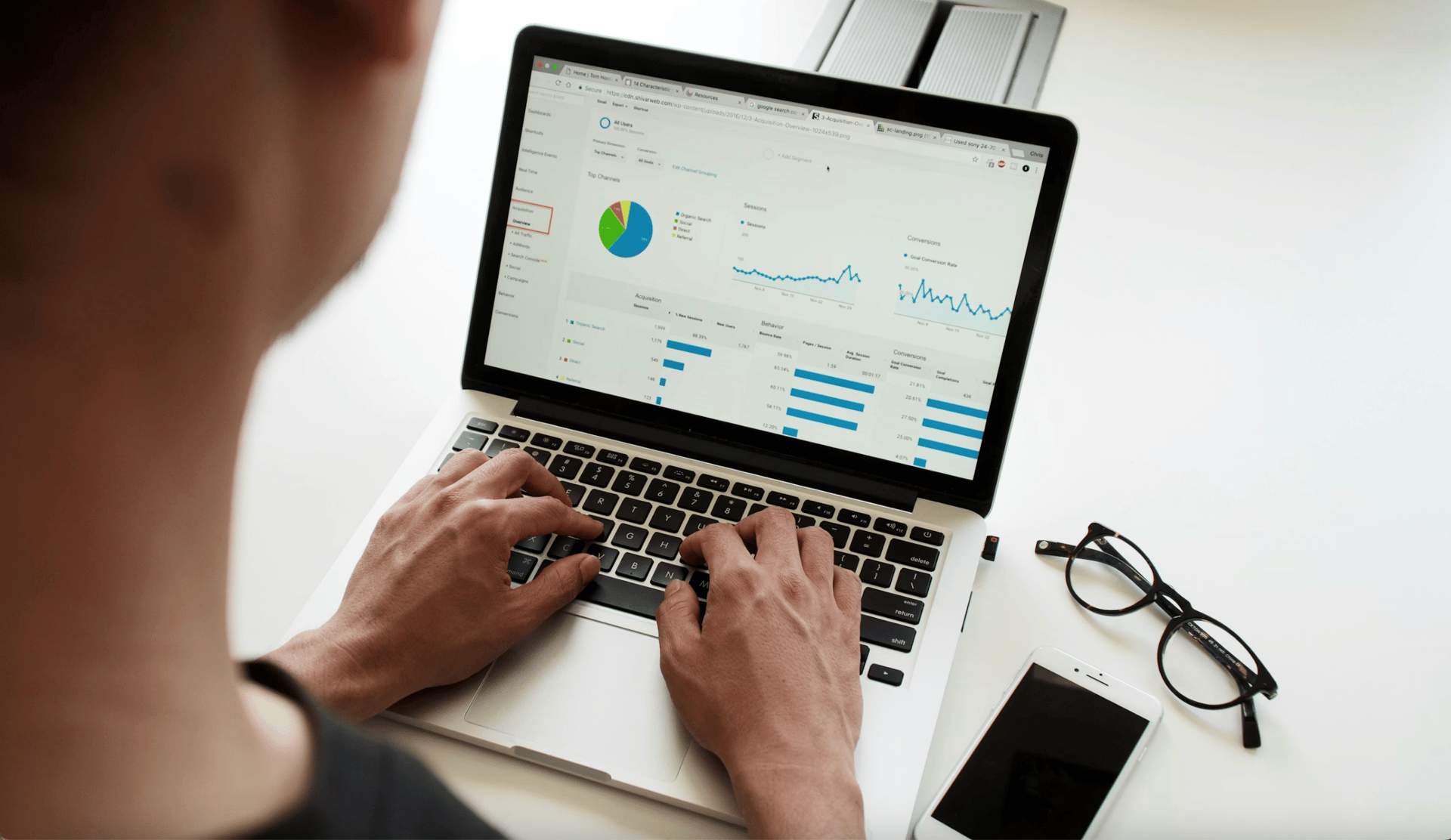 black and brown leather padded tub sofa