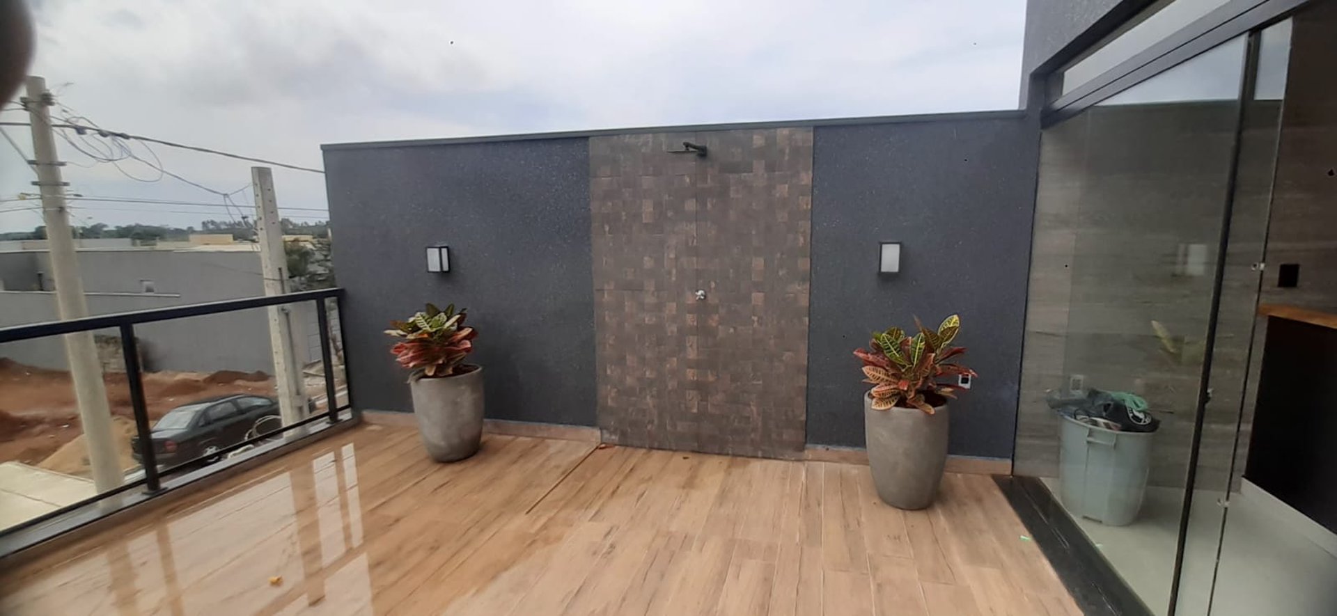 an abstract photo of a curved building with a blue sky in the background