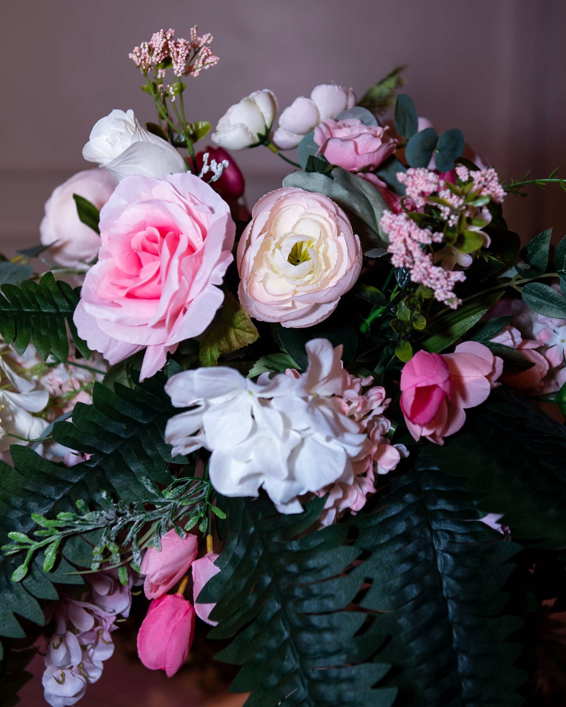 an abstract photo of a curved building with a blue sky in the background