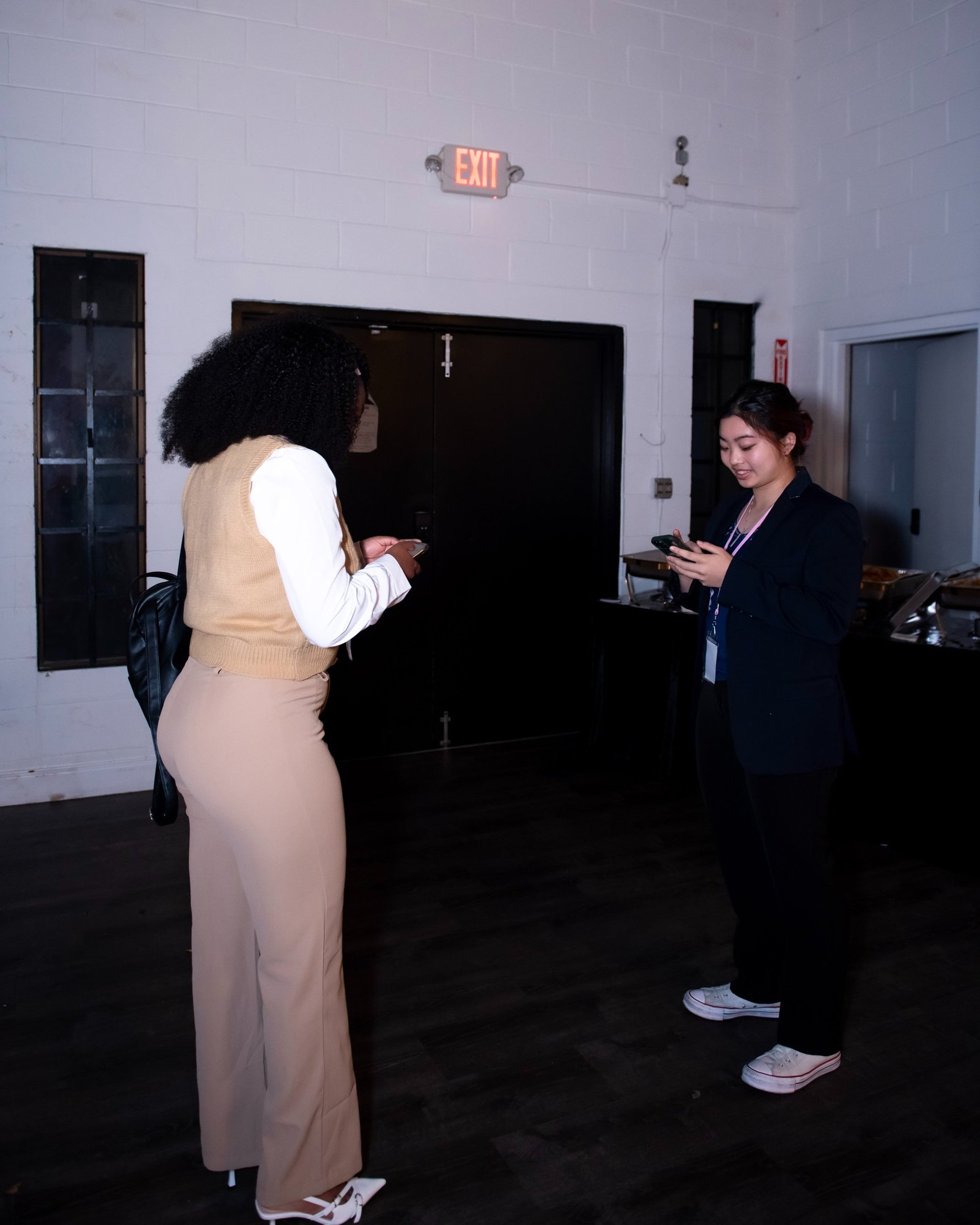 an abstract photo of a curved building with a blue sky in the background