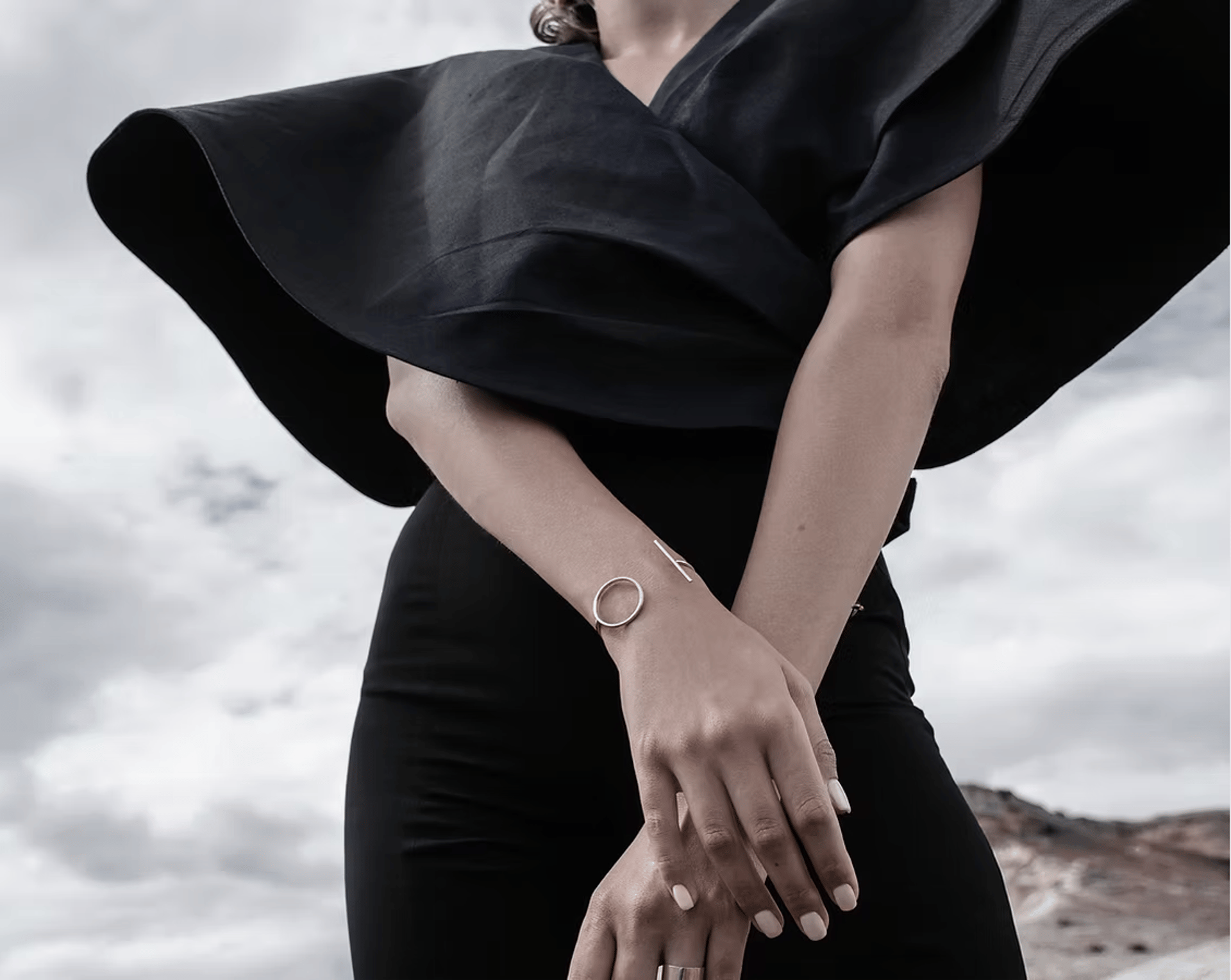 an abstract photo of a curved building with a blue sky in the background