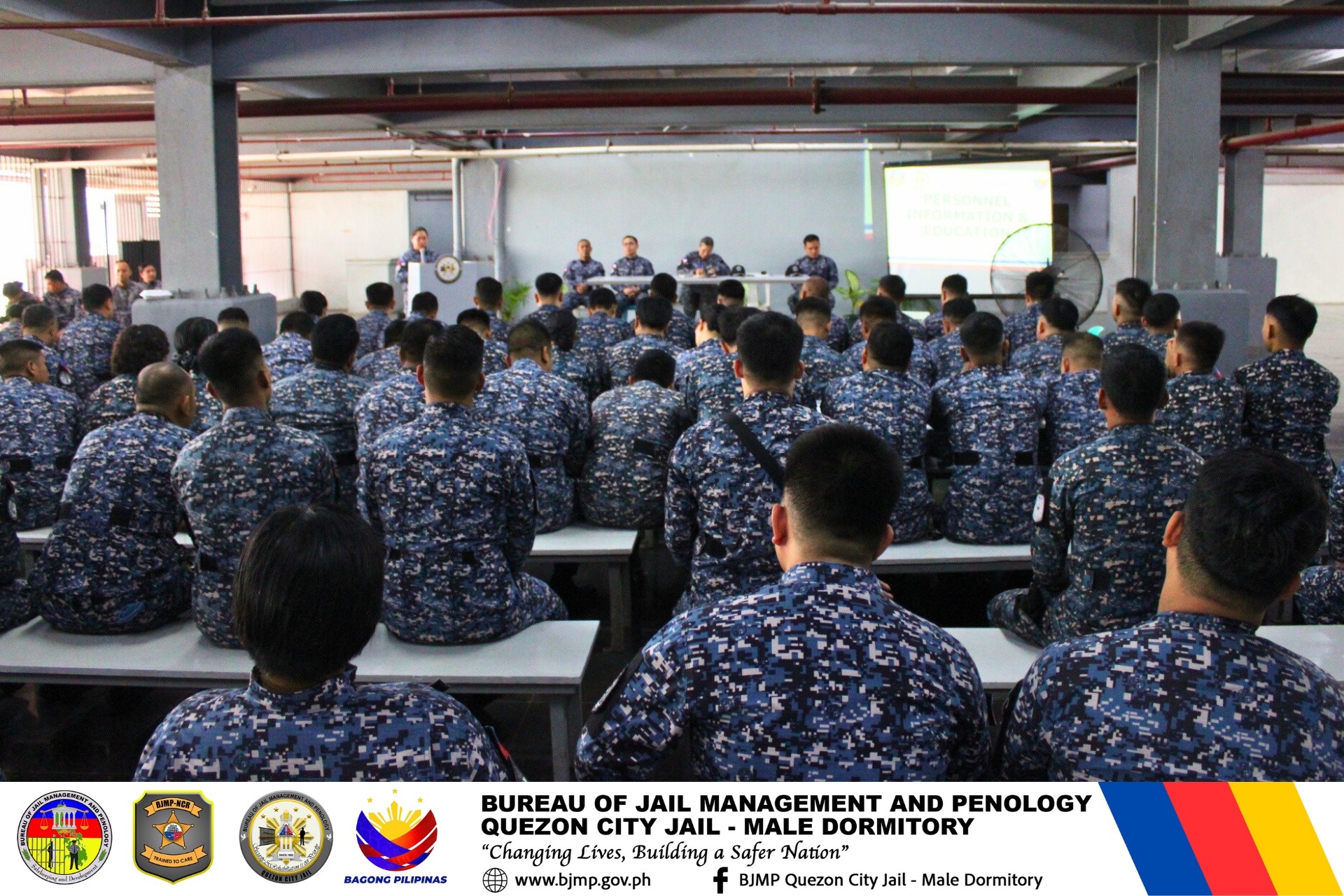 an abstract photo of a curved building with a blue sky in the background