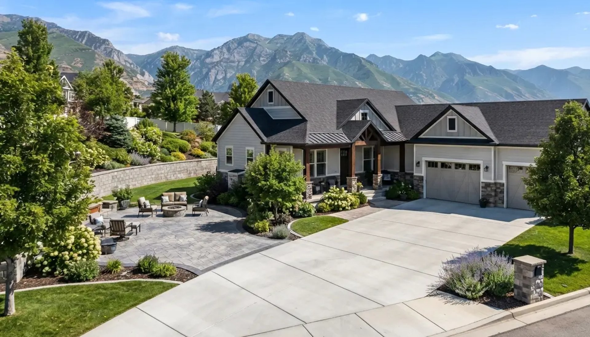 South Jordan home featuring concrete driveway and patio