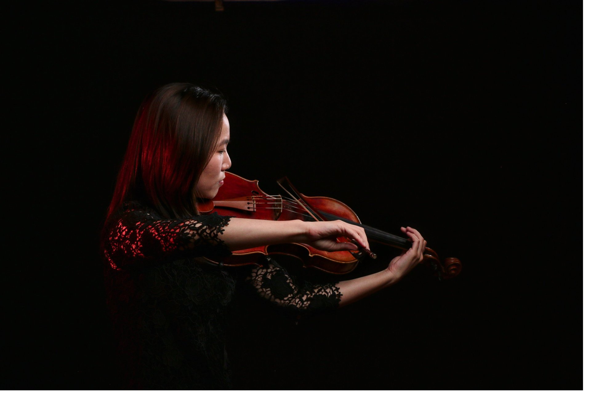 A musician plays the violin.