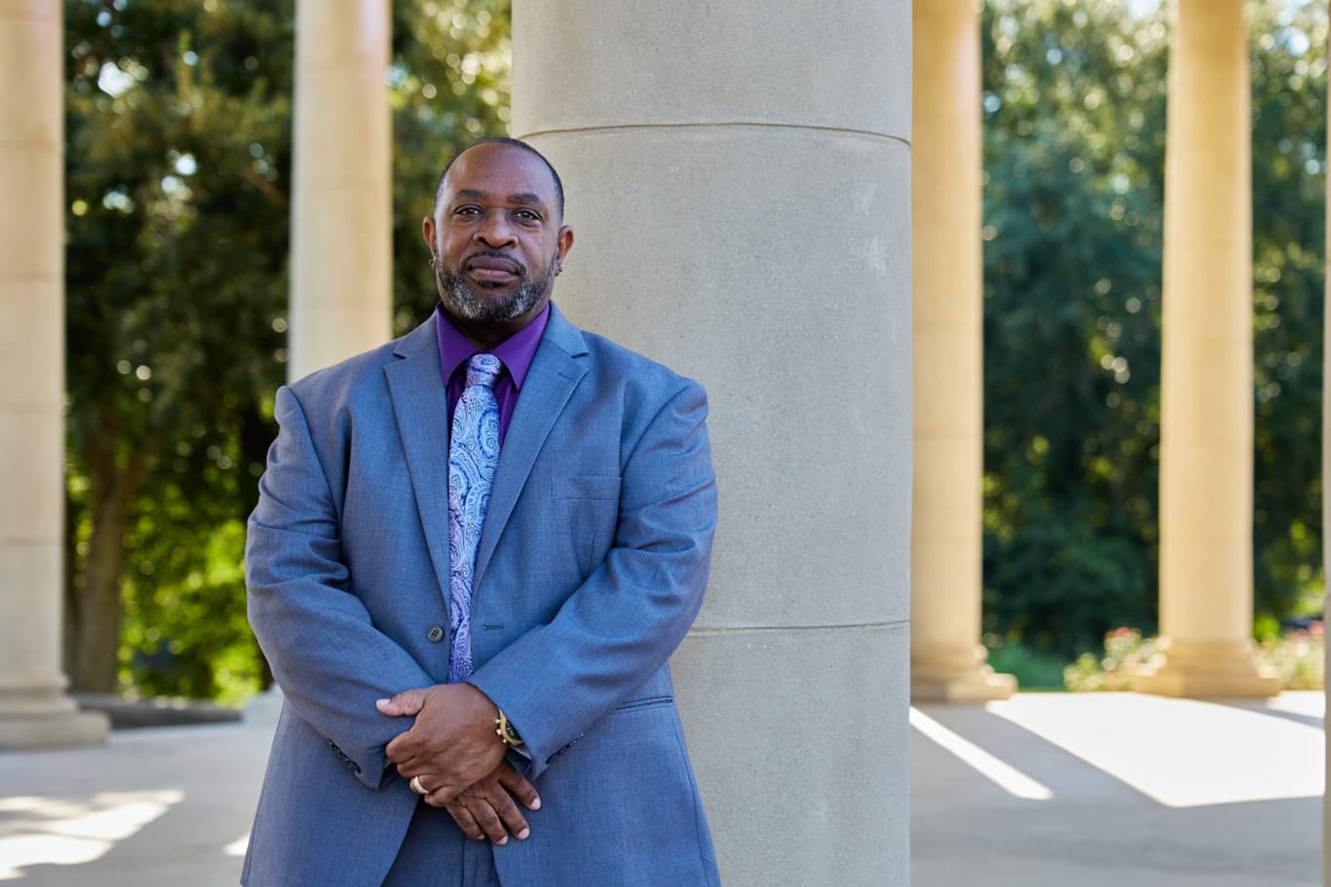 an abstract photo of a curved building with a blue sky in the background