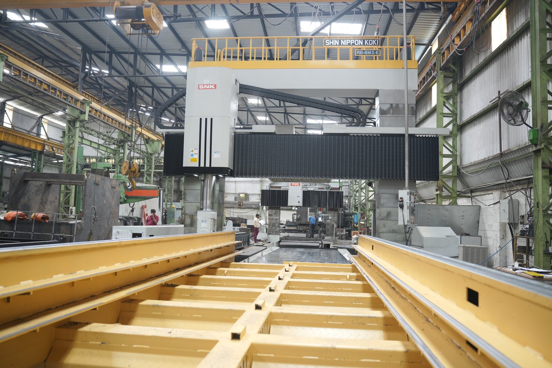black and brown leather padded tub sofa