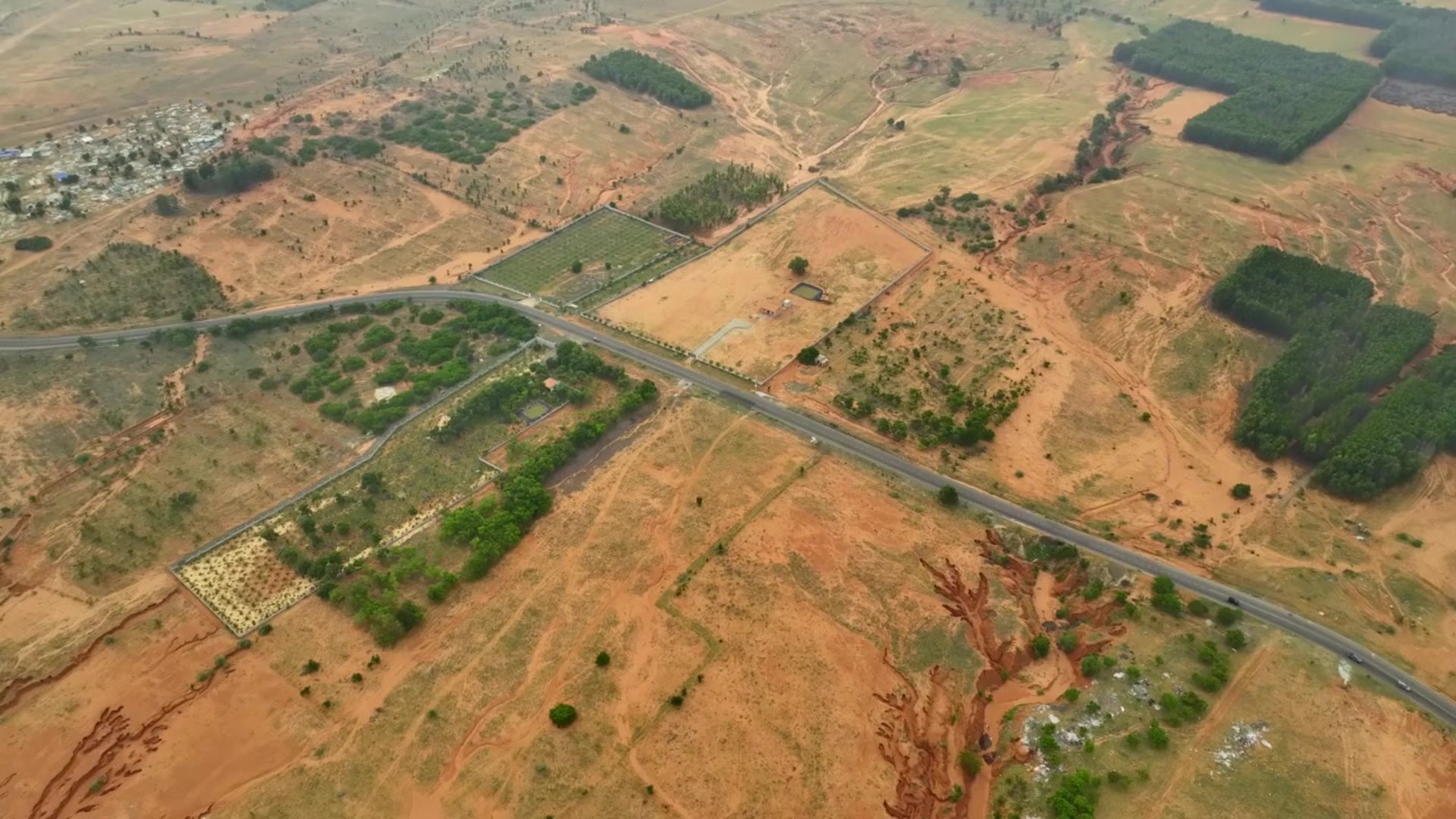 an abstract photo of a curved building with a blue sky in the background