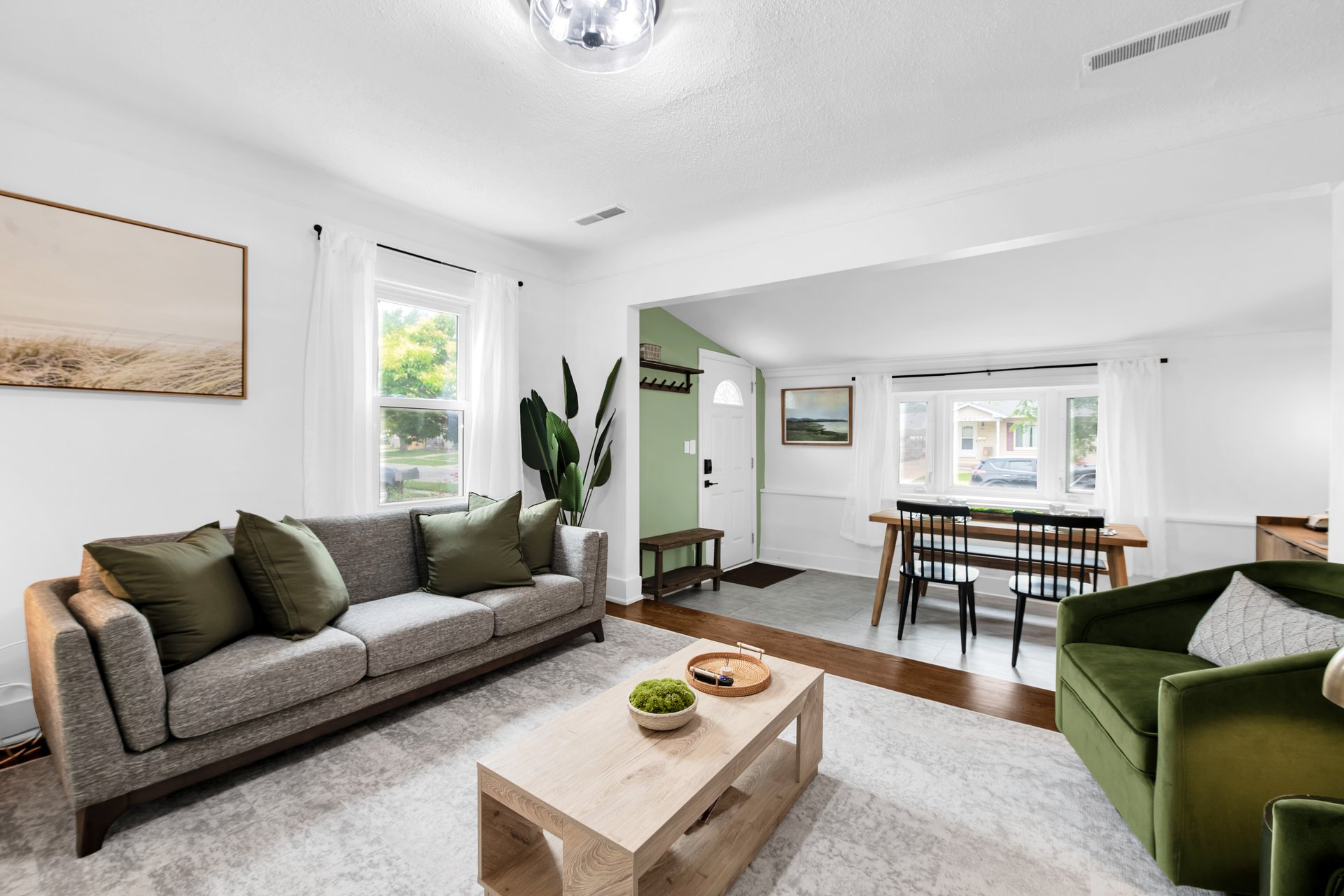 black and brown leather padded tub sofa